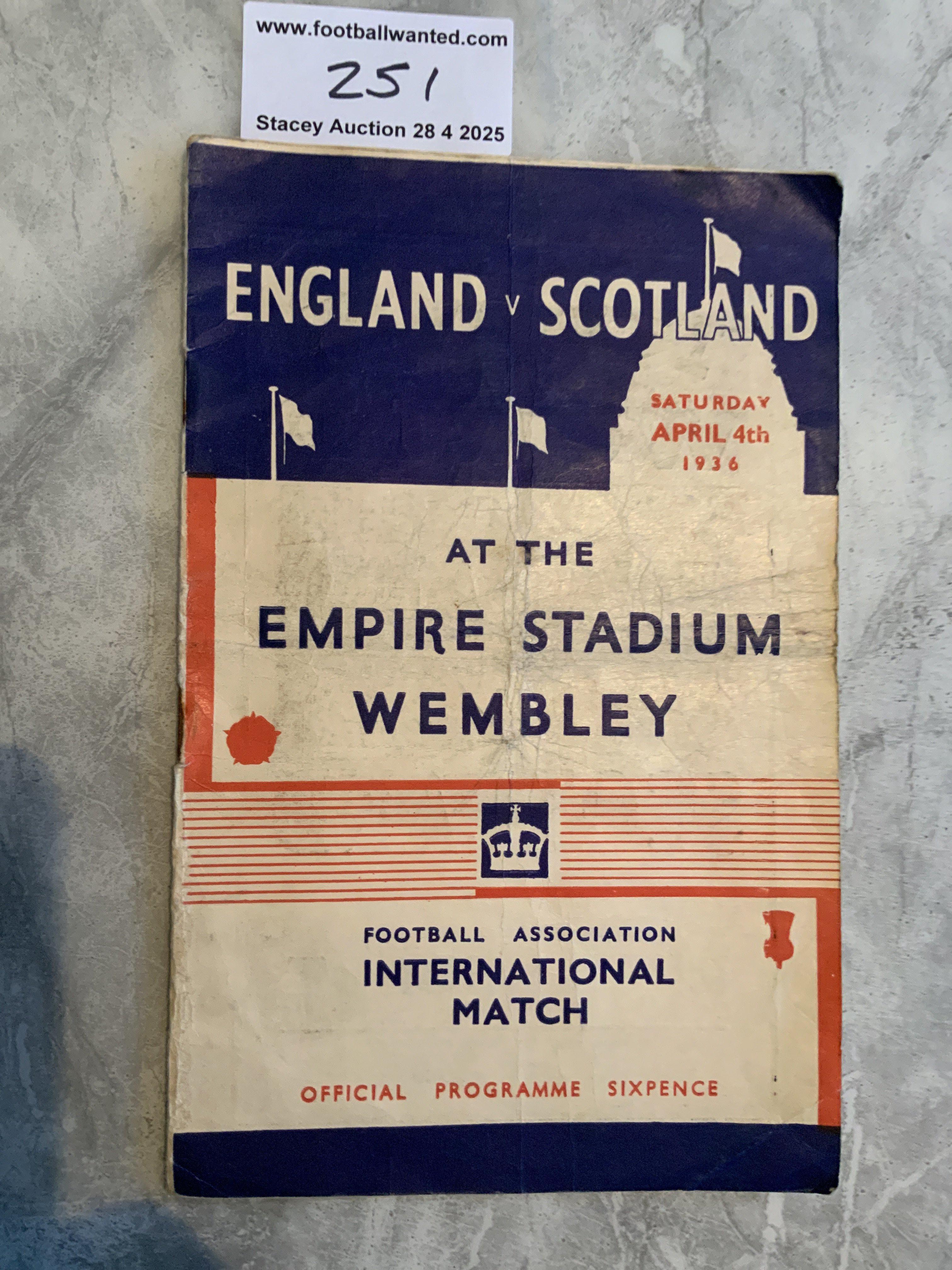1936 England v Scotland Football Programme: Fair condition programme with no team changes. Rusty staple holding firm. Wear to bottom right hand corner of inner pages and fold.