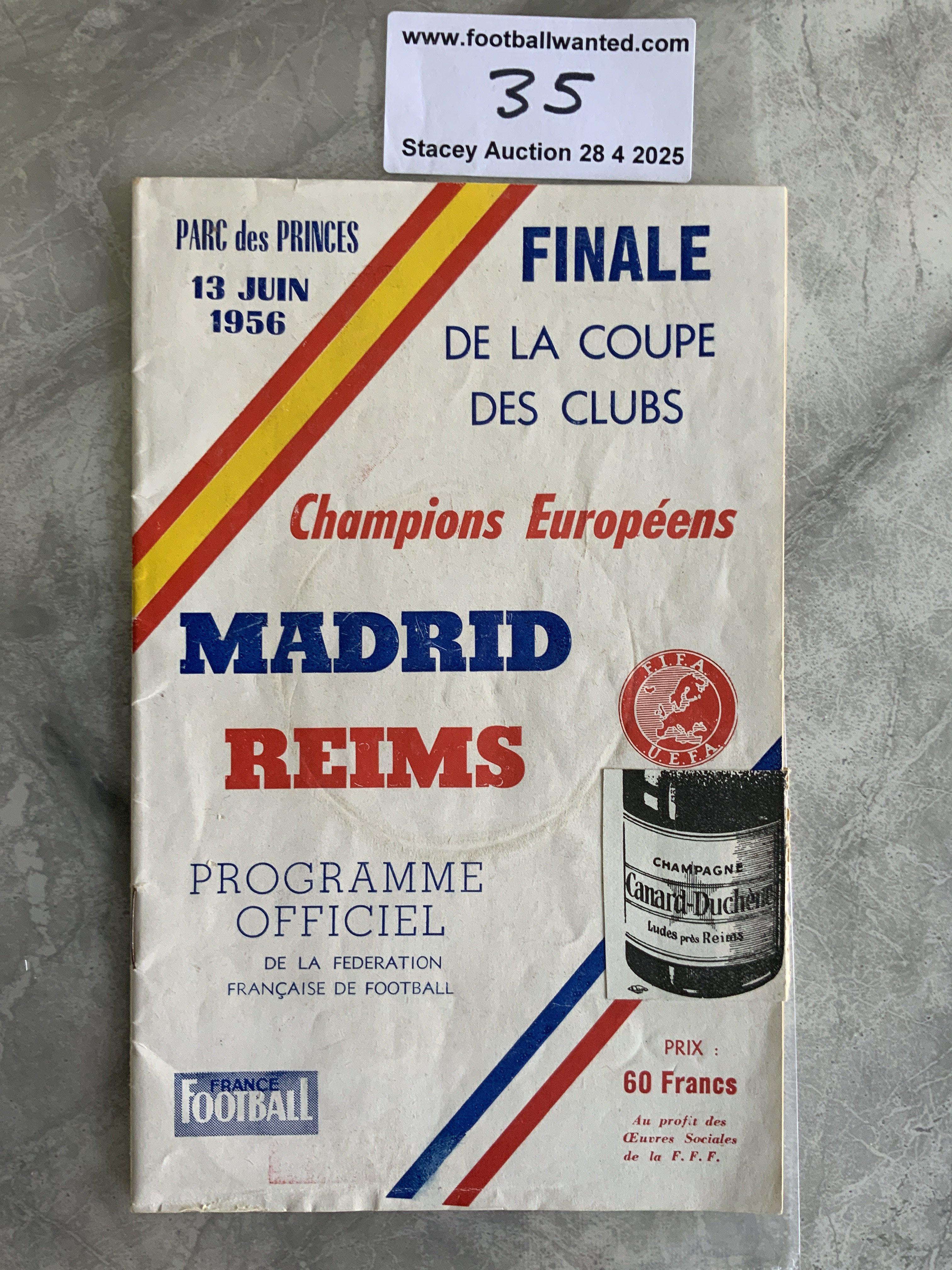 1956 Rare European Cup Final Football Programme: Real Madrid v Reims played in Paris. Good condition with no team changes. Very light cup mark to cover. Champagne bottle sticker as always ripped in order that you can read the programme. C/W tatty France Football paper covering the first ever European Cup final.