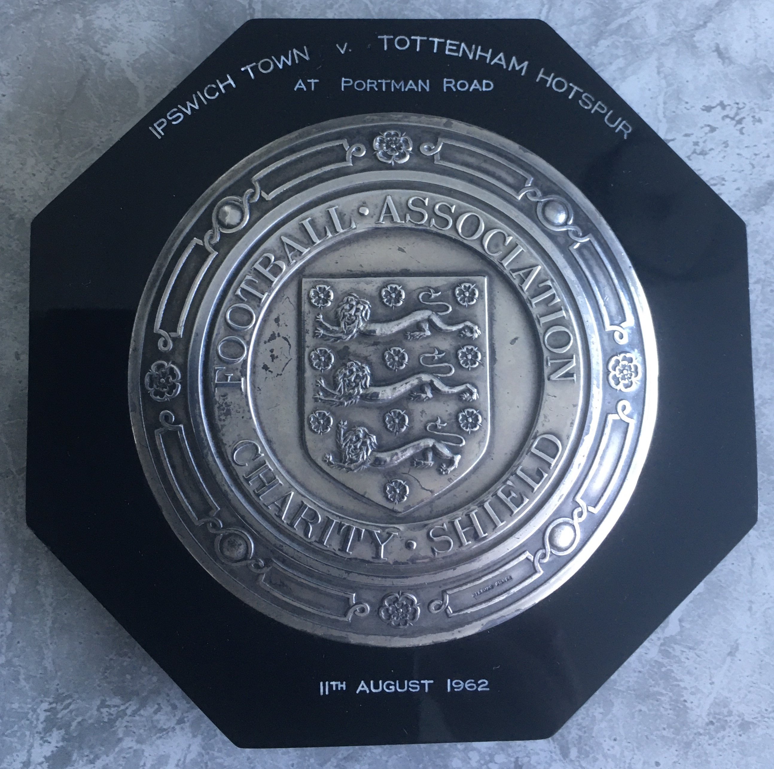 Danny Blanchflower Tottenham 1962 Charity Shield Football Plaque: Wording states Ipswich Town v Tottenham Hotspur At Portman Road 11th August 1962 with Football Association Charity Shield on inner circle. Was sold at Christies on 15 10 1997 for 1293 pounds. Stunning item from Spurs best team and possibly best player at the time.