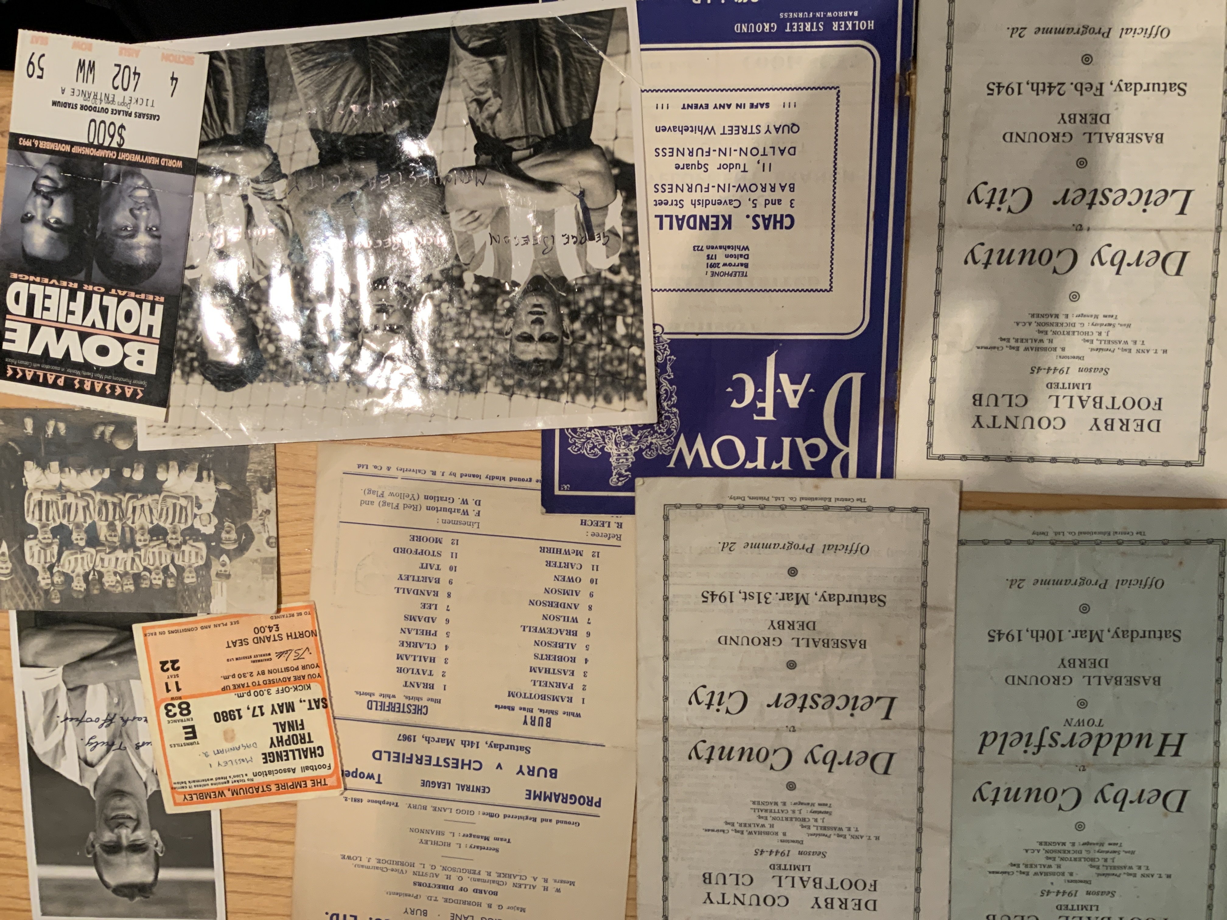 Football Programmes + Memorabilia: 44/45 Derby v Huddersfield + Leicester 24/2 + 31/3. C/W 1993 Bowe v Holyfield Boxing ticket and a Derby County postcard from 1906/07.