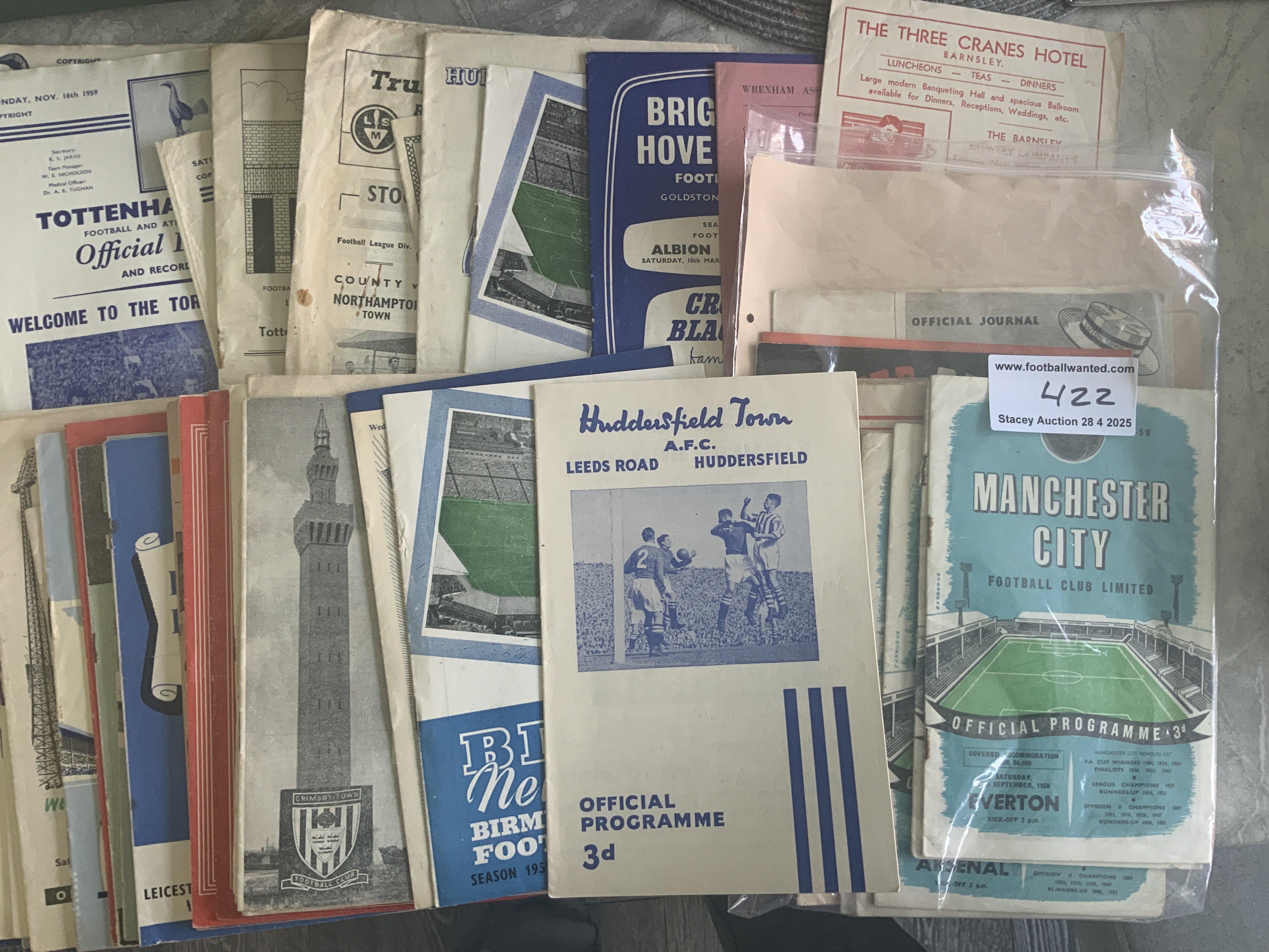 1950s Football Programmes: Wide selection to include 50/51 Huddersfield v Middlesbrough, 55/56 Barnsley v Notts Forest, Brighton v Coventry, 57/58 Wrexham v Scunthorpe. Good. (57)