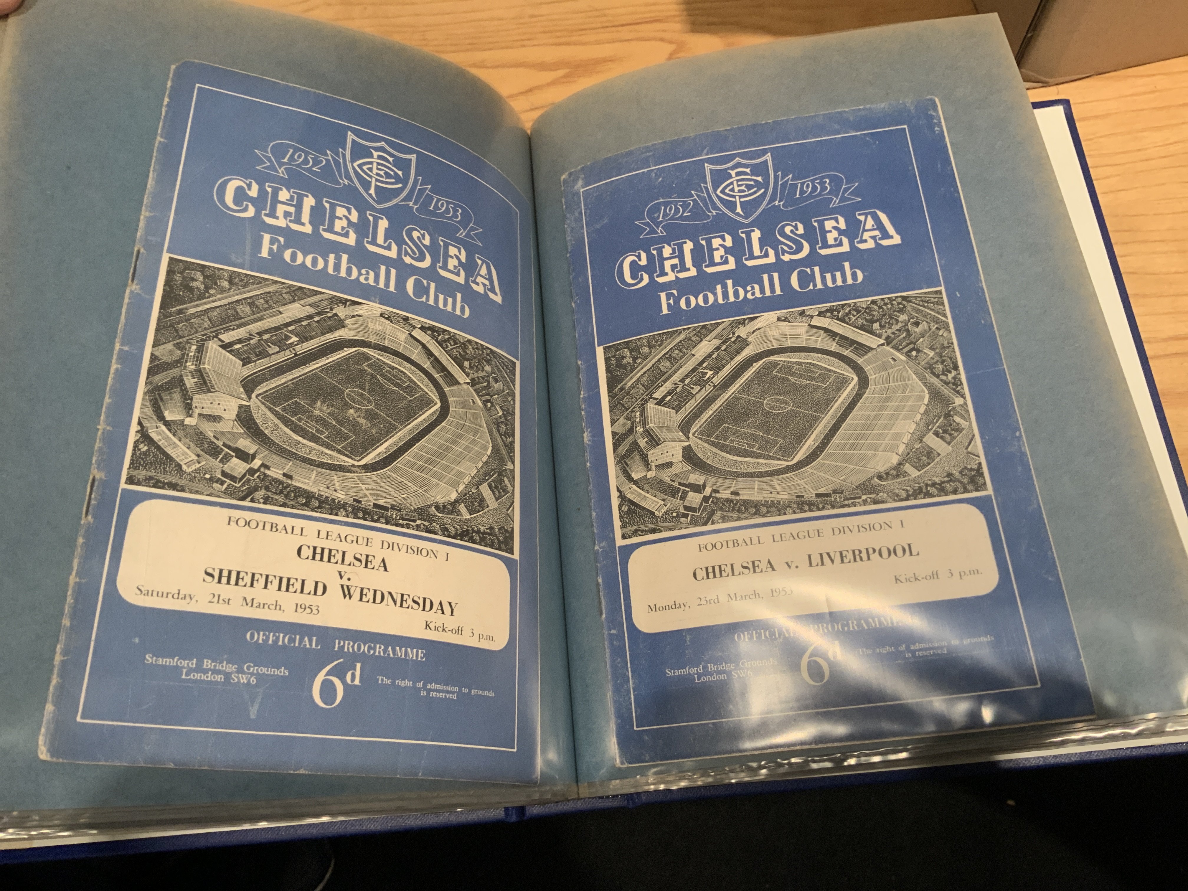 52/53 Chelsea Home Football Programmes: All 21 league home football programmes plus 3 cup in very good condition in a blue binder with gold lettering stating Chelsea FC Homes 1952-53. Includes harder to obtain Stoke and Liverpool. (24)