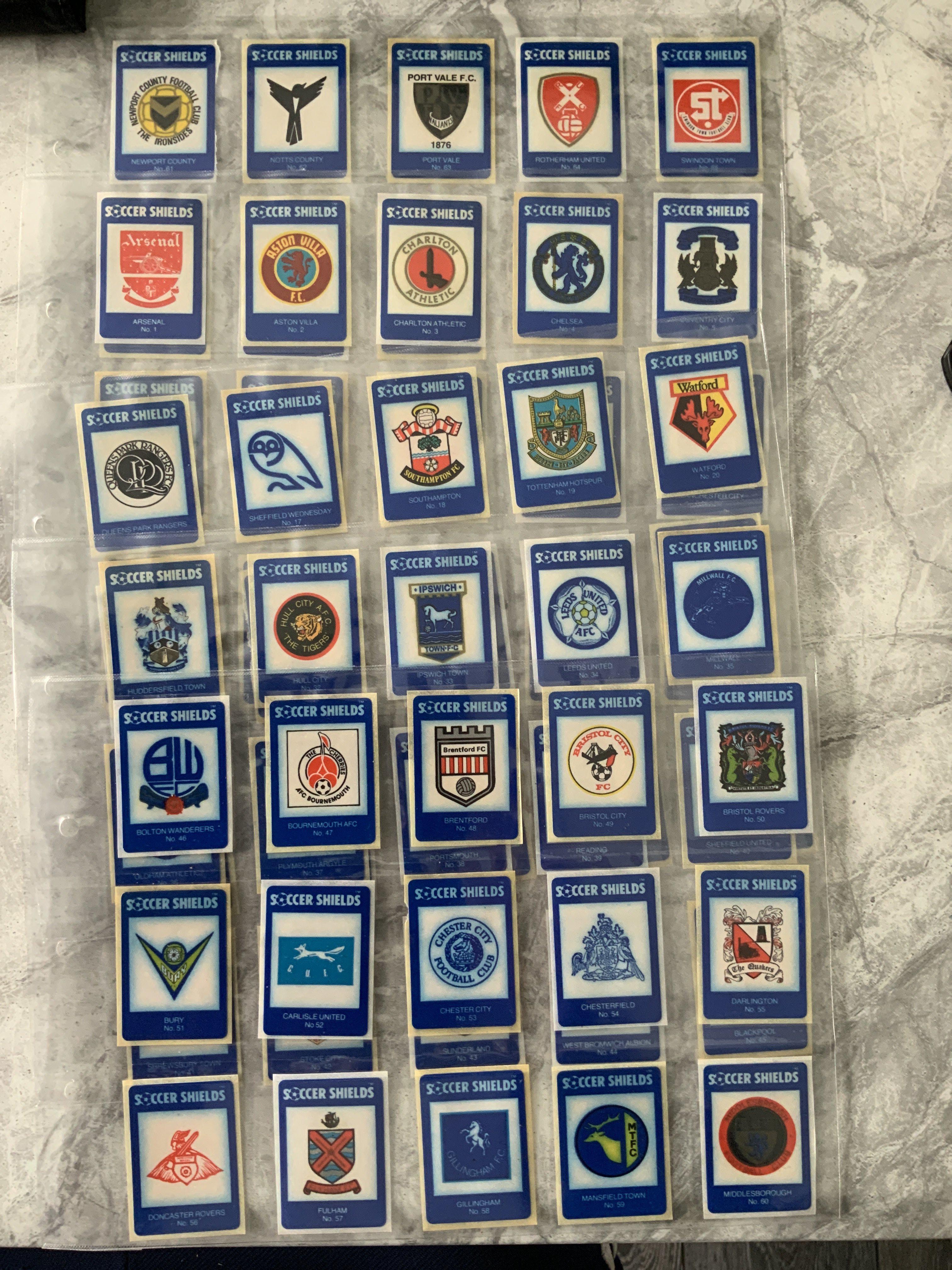 Swizzels Full Set Of Marlow Soccer Shields: All 68 club badges produced in the 1986/87 season. Excellent condition with advert, wrapper and full list of the numbered cards. (68)