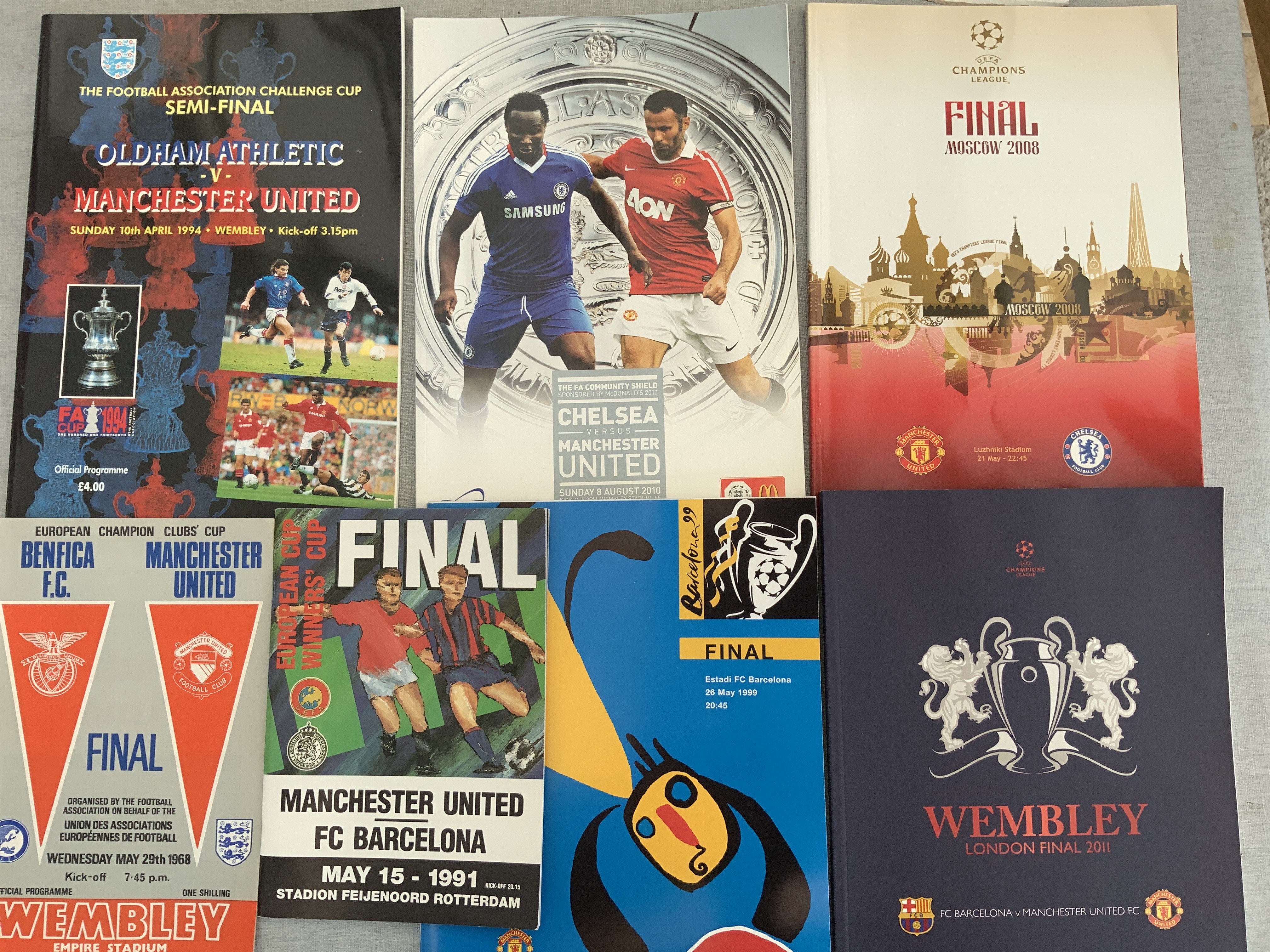 Manchester United Big Match Football Programmes: European Cup finals for 1968 1999 2008 2011 and a few other big match. C/W an album of Man Utd photos.