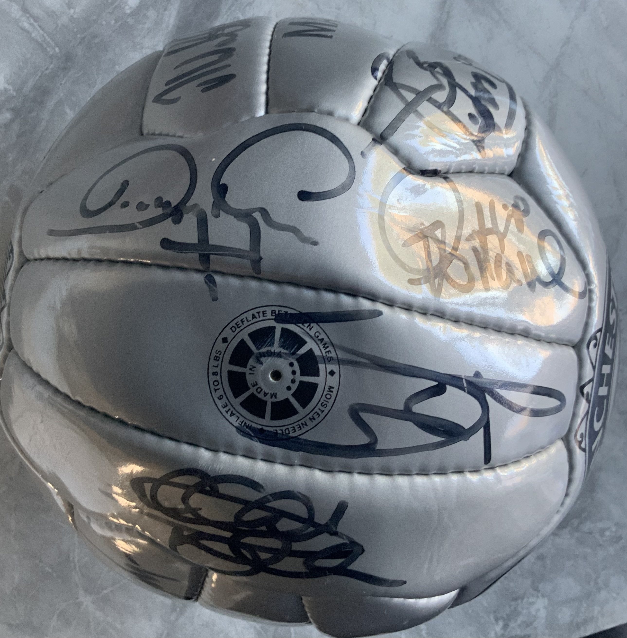 Manchester United Signed Football: Grey official Manchester United football from around the millennium with autographs to include Sheringham Fortune Irwin Solskjaer Gary + Phil Neville Silvestre and many others.