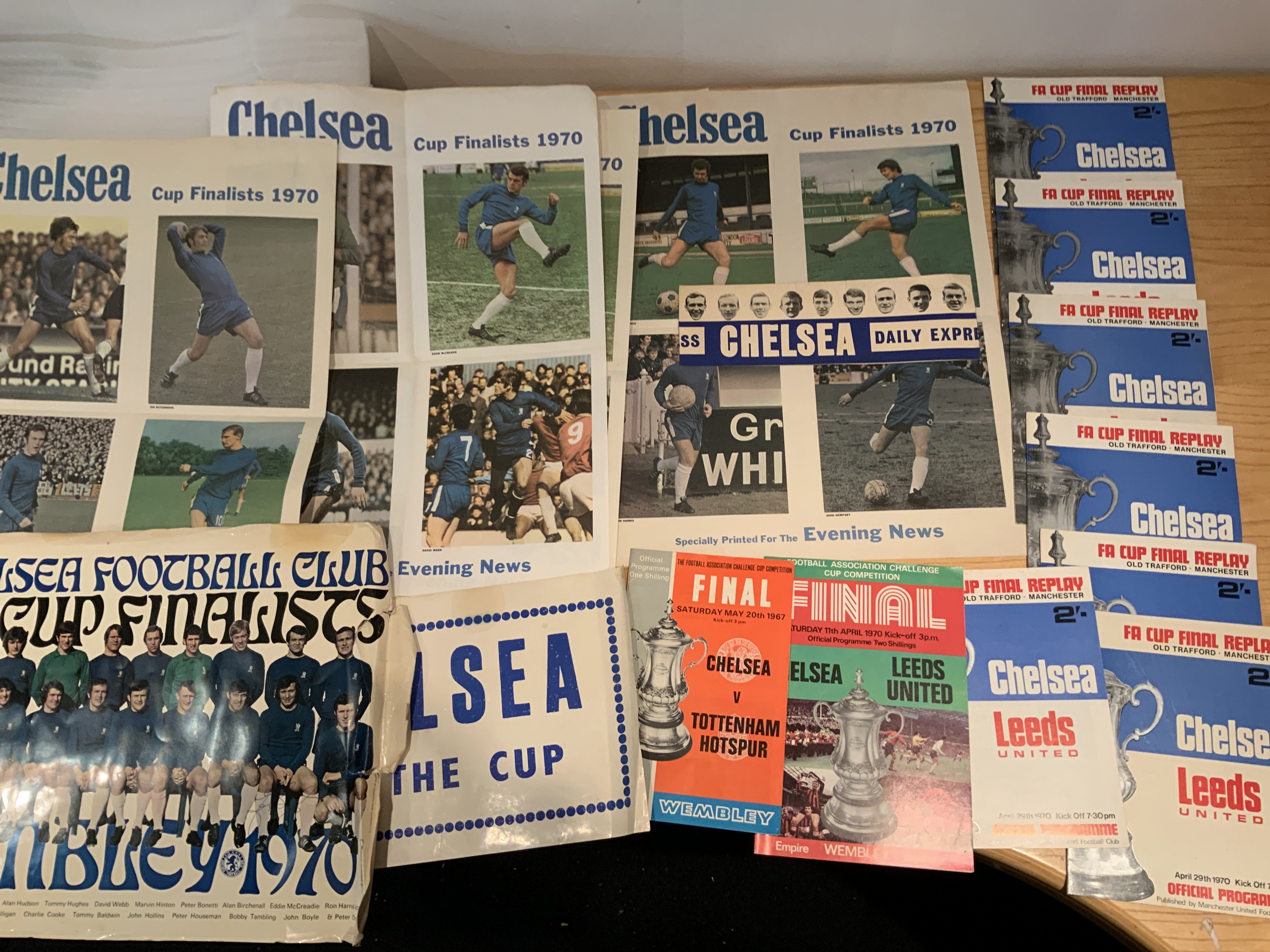 Chelsea Football Memorabilia Box: Many items regarding the 1970 FA Cup final including 7 mint condition replay programmes, Evening News posters, newspapers, brochures and more. Other papers and memorabilia included.