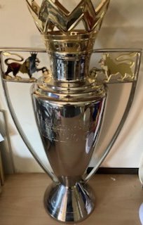 Premier League Football Trophy: Excellent replica trophy measuring 50cm high and 24cm across at widest point. Look great in bar with red ribbons on this year. Realistic looking trophy is about half the size of the original.