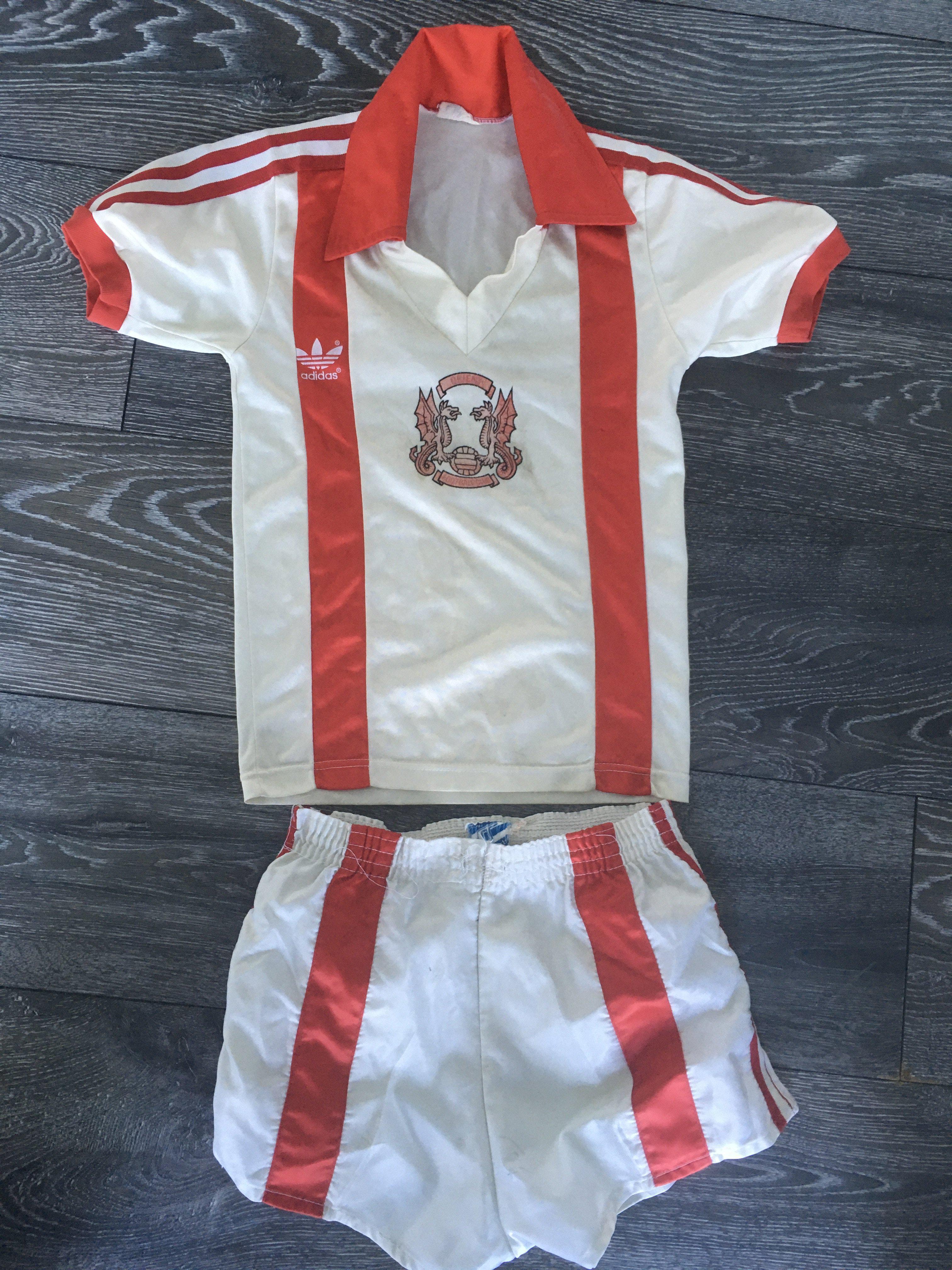 Orient 1980 - 1981 Replica Football Kit: Kids Adidas shirt and matching Spall Sports shorts. Very rare to find this iconic original kit from their centenary year.