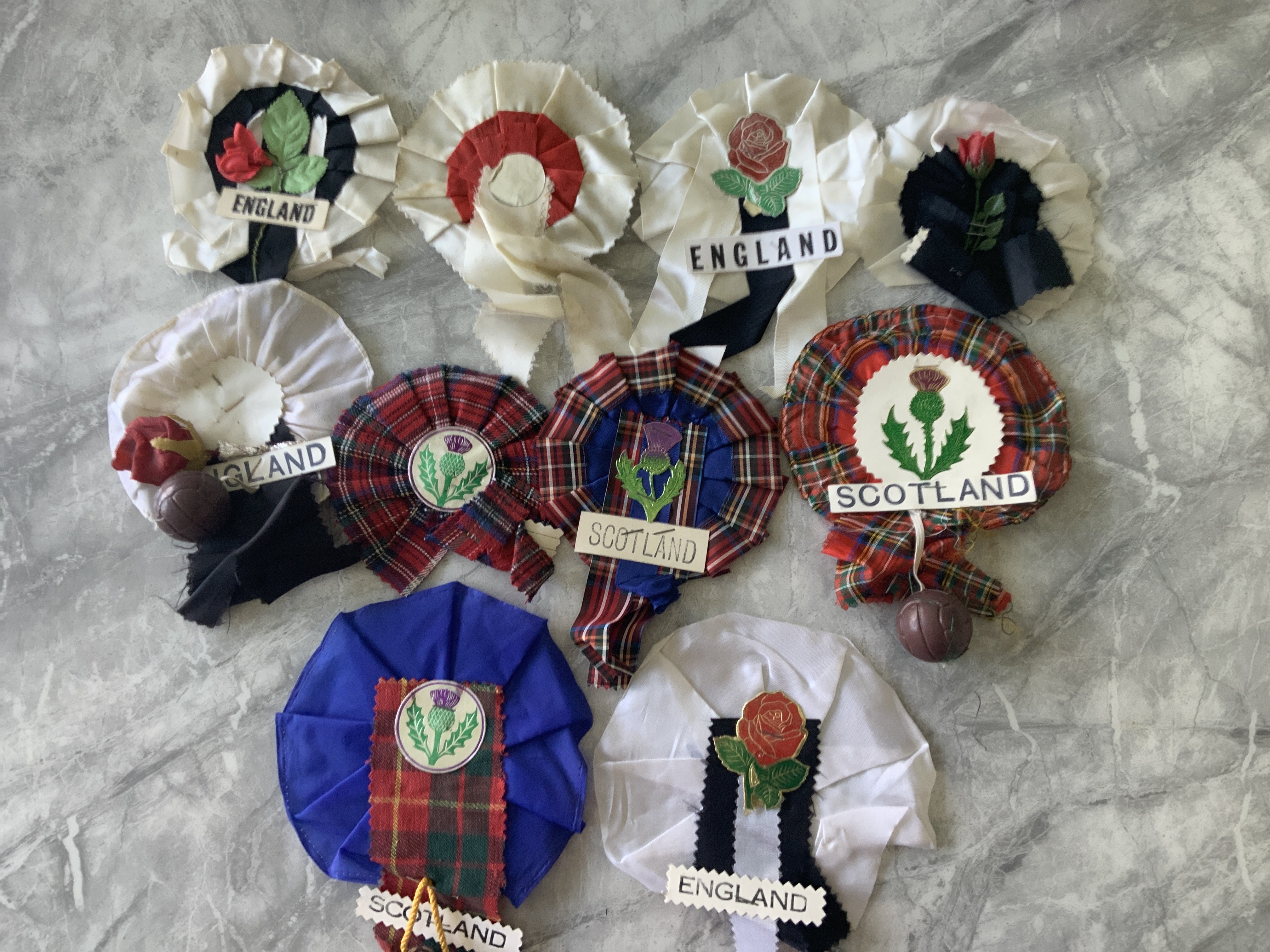 England + Scotland Football Rosettes: Fair condition and all different. (10)