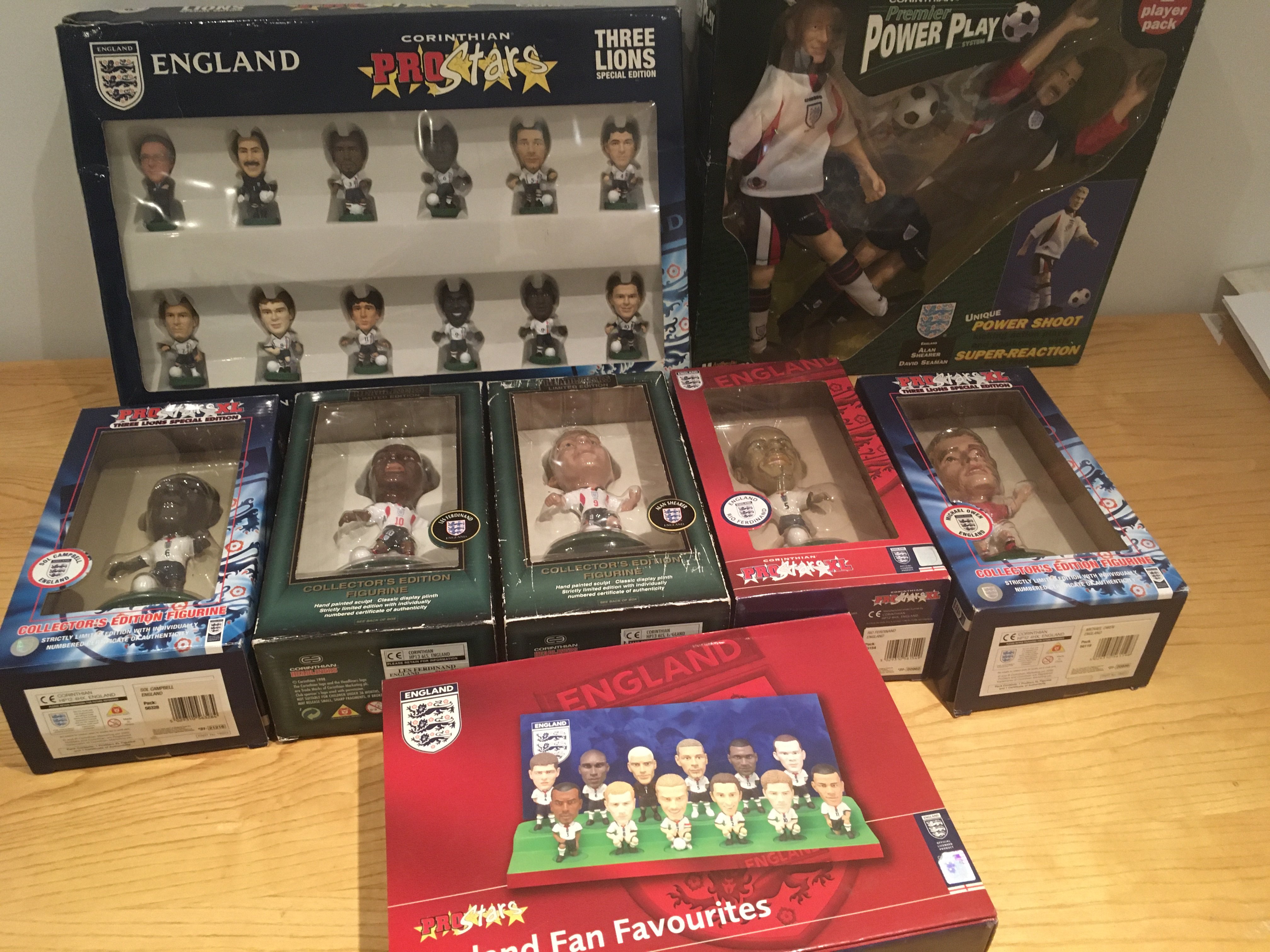England Corinthians Boxed Figures: Includes Shearer and Seaman Power Play 12 inch set, England Fan Favourites, Pro Stars Three Lions and large individual Shearer, Les Ferdinand, Owen and Rio Ferdinand. Slight wear to some boxes. (8)