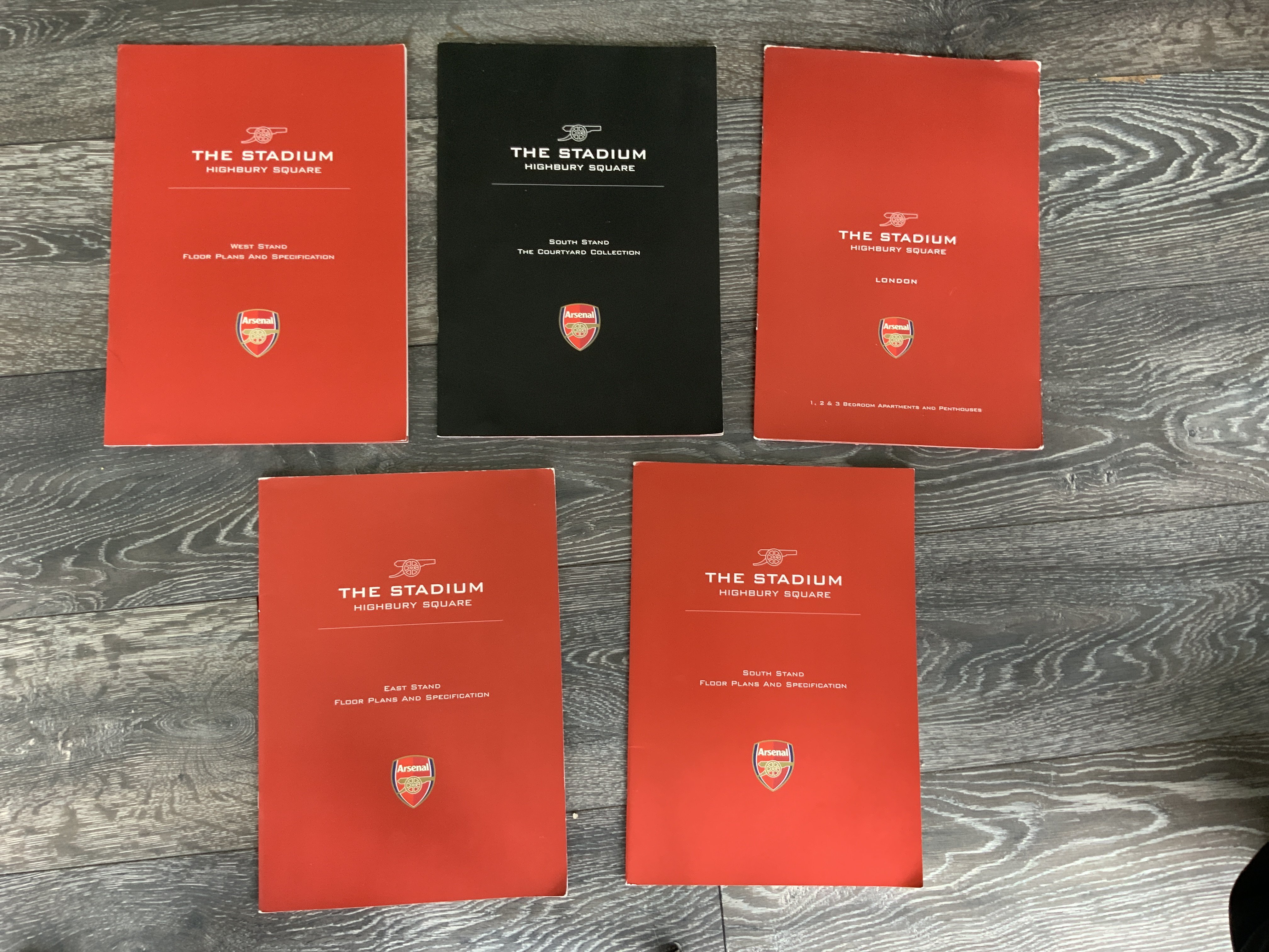 Arsenal Selling Highbury Stadium 2006 Brochures; 5 different brochures with floor plans and specifications for parts of the old stadium which were going to be made into apartments. Brochures for East Stand, South Stand, South Stand Courtyard, West Stand and Highbury Square. All very good except Highbury Square which has damage to the back page. (5)