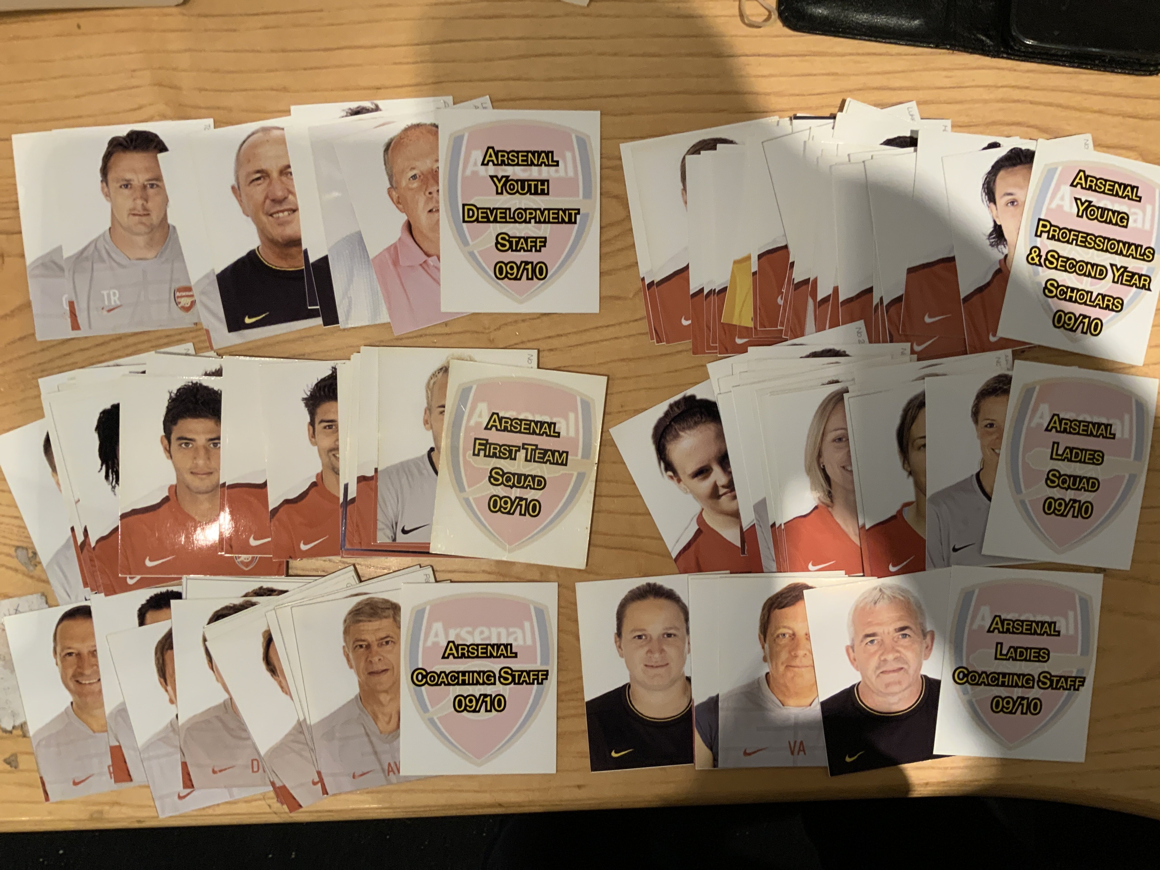 Arsenal Rare Football Card Sets: Possibly the only set in existence. Each season has an individual picture of all playing staff and coaches at all levels. For example season 2009/2010 has 29 1st team, 15 1st team coaching staff, 36 young professionals and 2nd year scholars, 9 youth development staff, 21 Ladies squad and 5 Ladies coaches. The sets are for all seasons 2009/10 to 2014/15. The 6 seasons are similar so must contain 650 cards all measuring 90 x 70 cm with shirt number, position and full name.