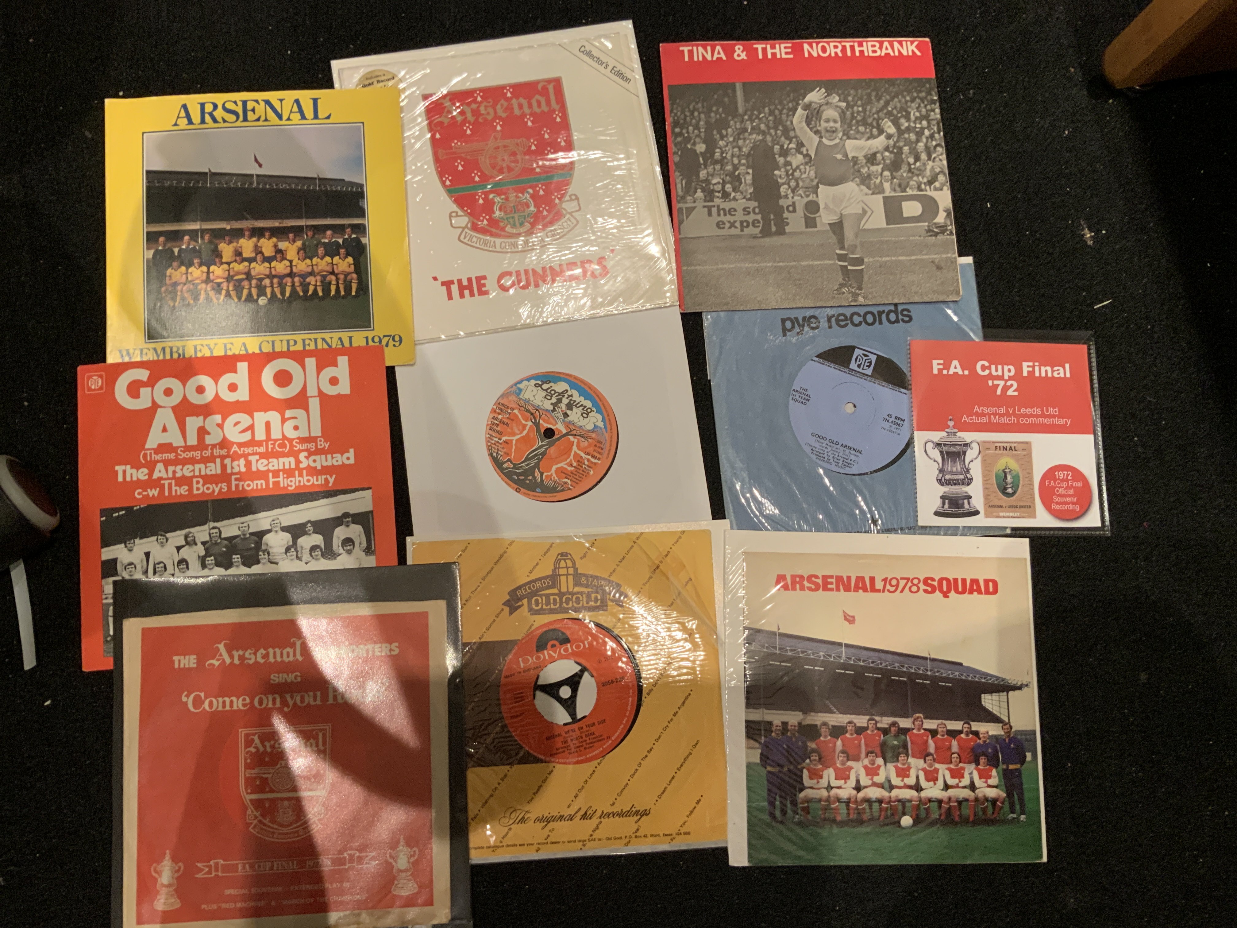 Arsenal 7 Inch Record Collection: Mainly 1970s to include Good Old Arsenal, 1978 + 1979 FA Cup Final Squad. Songs by Arsenal Supporters, The North Bank, Tina + The North Bank and more. (9)