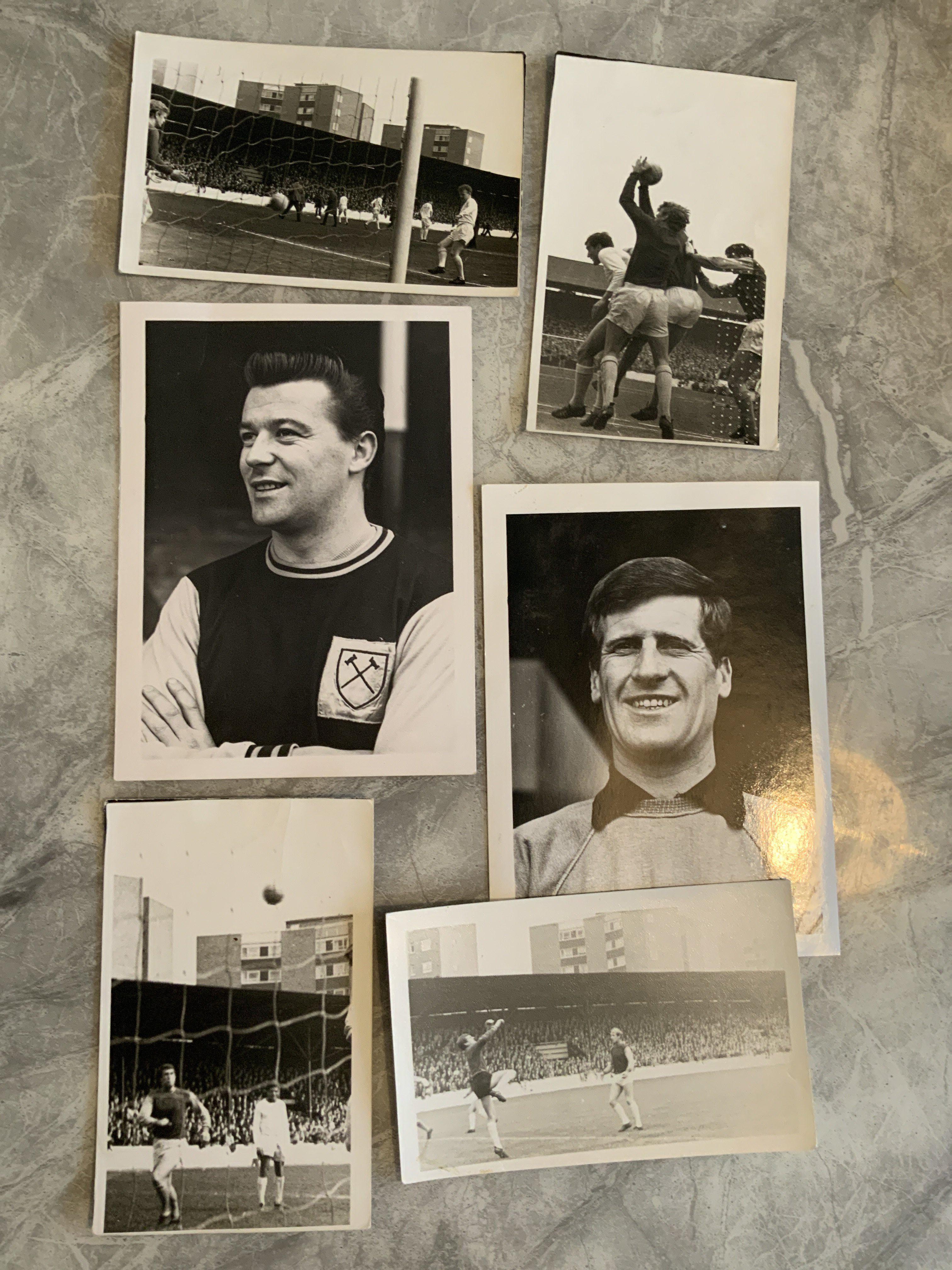 West Ham Football Press Photos: Original black and white press photos mainly from the 60s with a few early 70s. 18 are large and 6 are small all in good condition. Whilst these are press photos only around 6 have press stamps to rear. 22 are match action. (24)