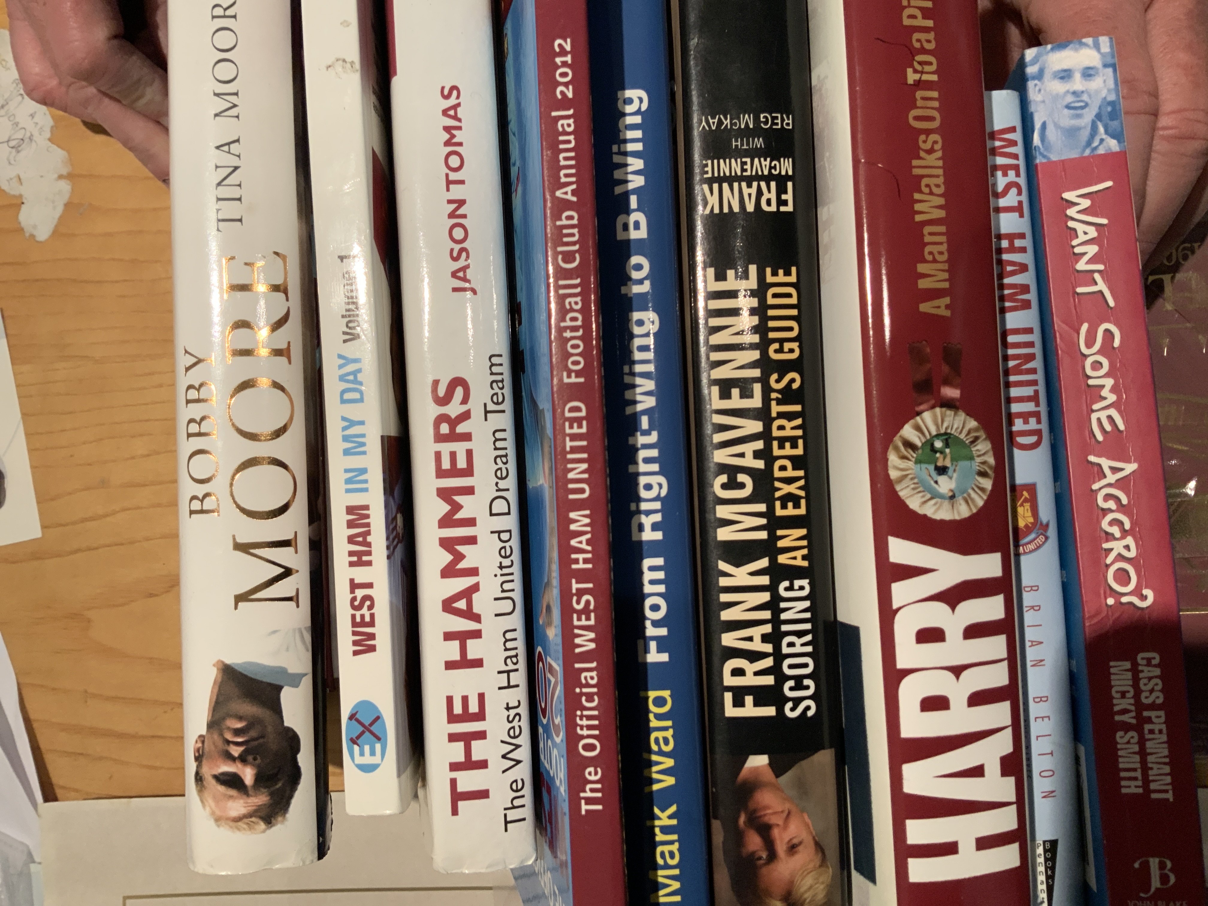 West Ham Football Memorabilia Box: Books, early Hammers News, programmes, programme inserts and a few 1966 World Cup items. C/W 1980 FA Cup replica shirt signed by 7 and a 1975 FA Cup final shirt signed by 3.