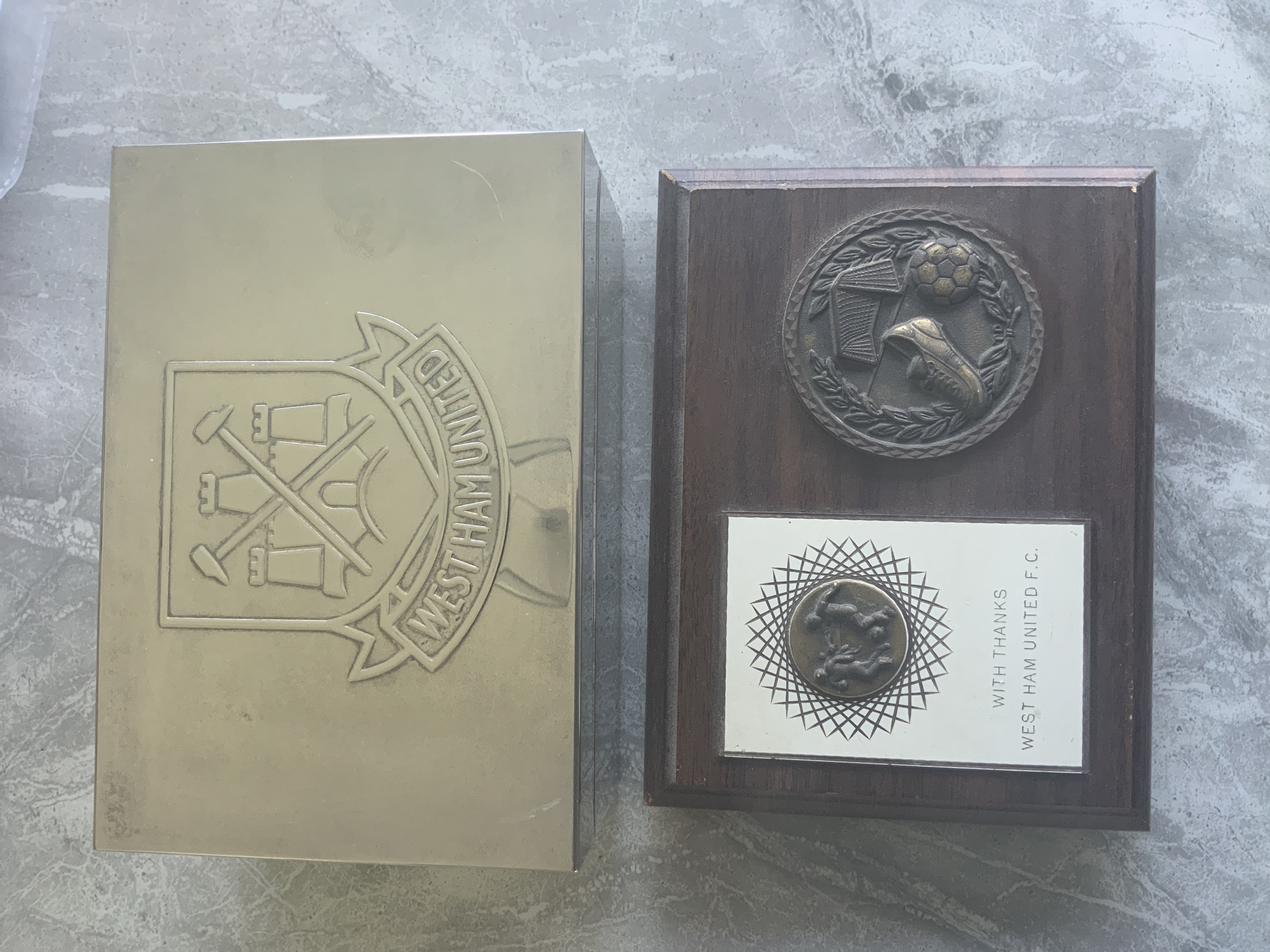 West Ham Football Memorabilia: Original German 1965 West Ham pennant listing 3 earlier ECWC winners then a West Ham badge and date of 1965 final. C/W a plaque stating thanks from West Ham, silver coloured small box with West Ham embossed logo and a few West Ham marbles.