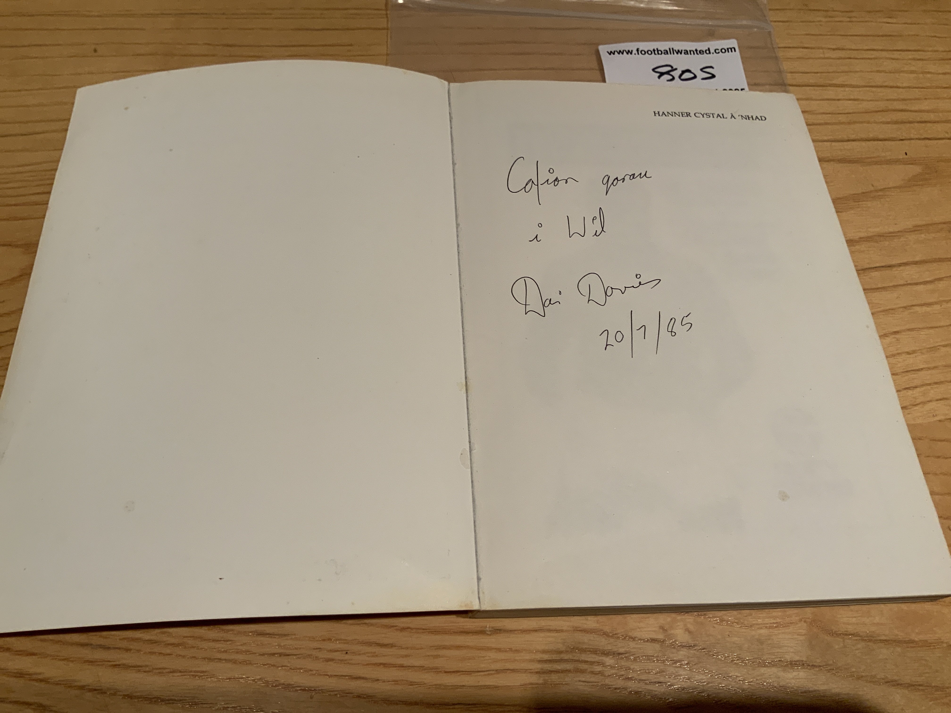 Dai Davies Signed Football Book: Soft cover book in Welsh signed by the Wales International player. Davies played for Everton Wrexham and Swansea.