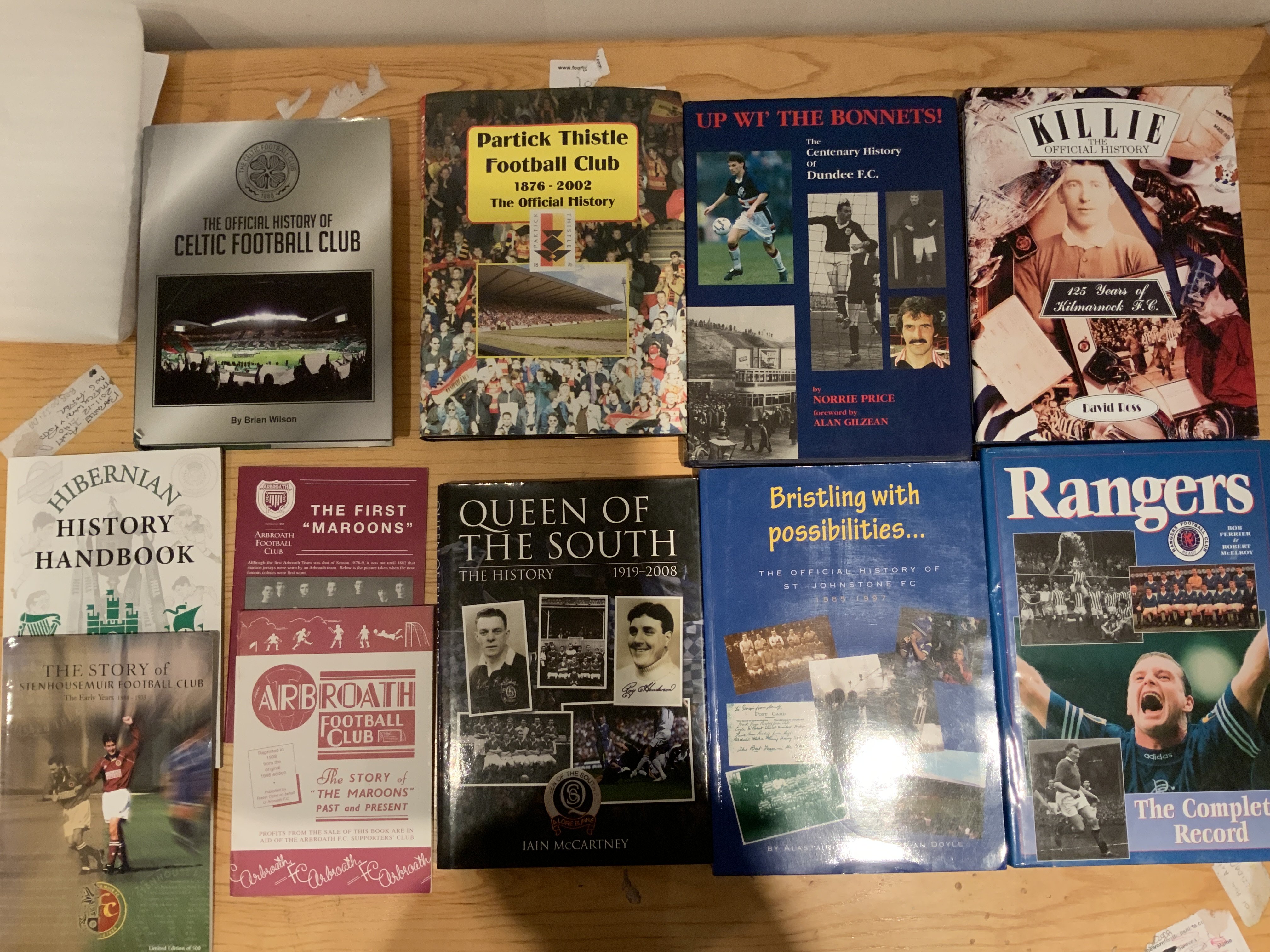 Scottish Club Football History Books: Large hardback books of Celtic Partick Thistle Dundee Kilmarnock Queen of the South St Johnstone and Rangers together with small soft cover histories of 4 others. Excellent. (11)