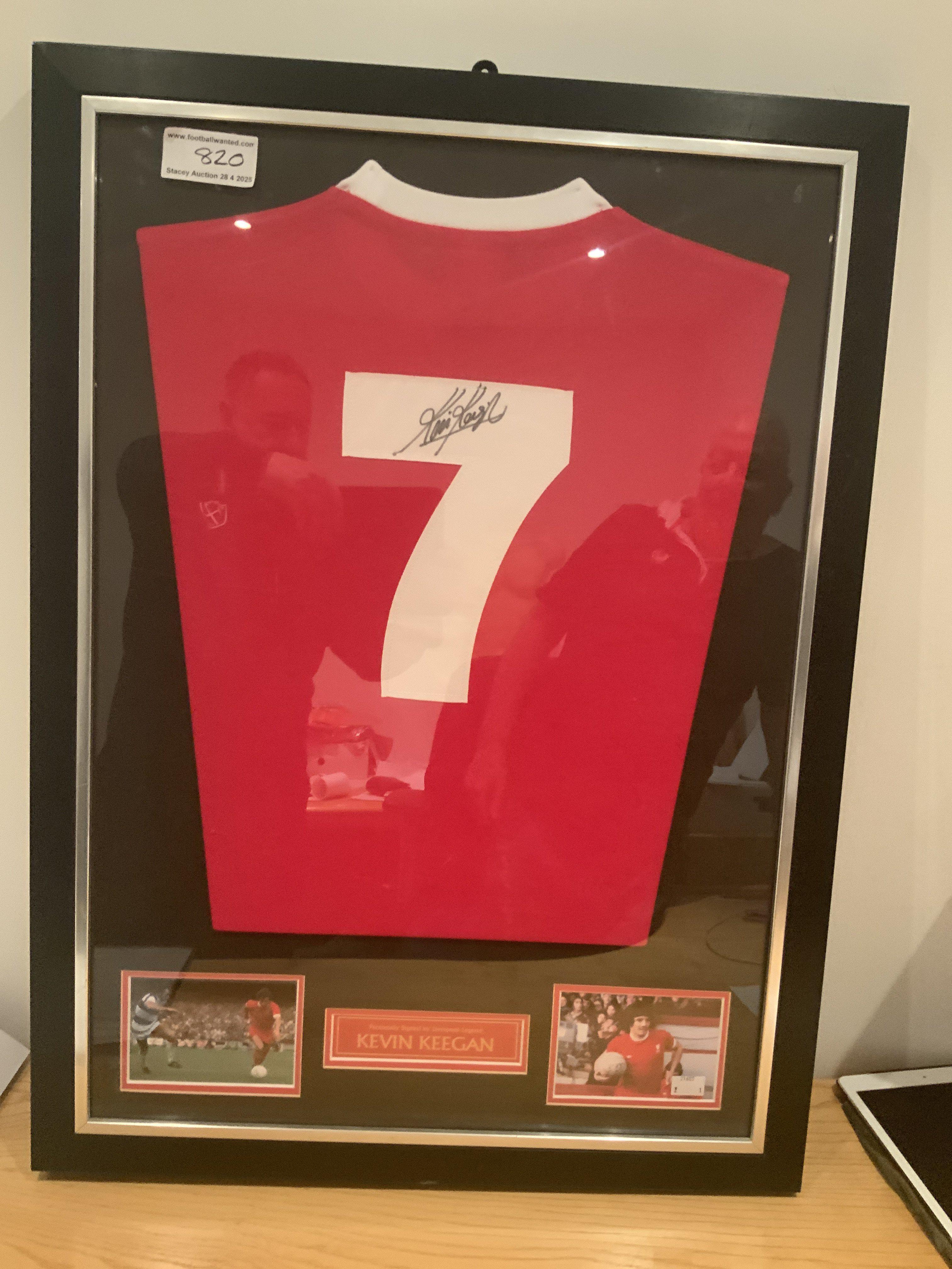 Kevin Keegan Signed Framed Liverpool Football Shirt: Number 7 replica red shirt signed to rear clearly in marker pen by Kevin Keegan.