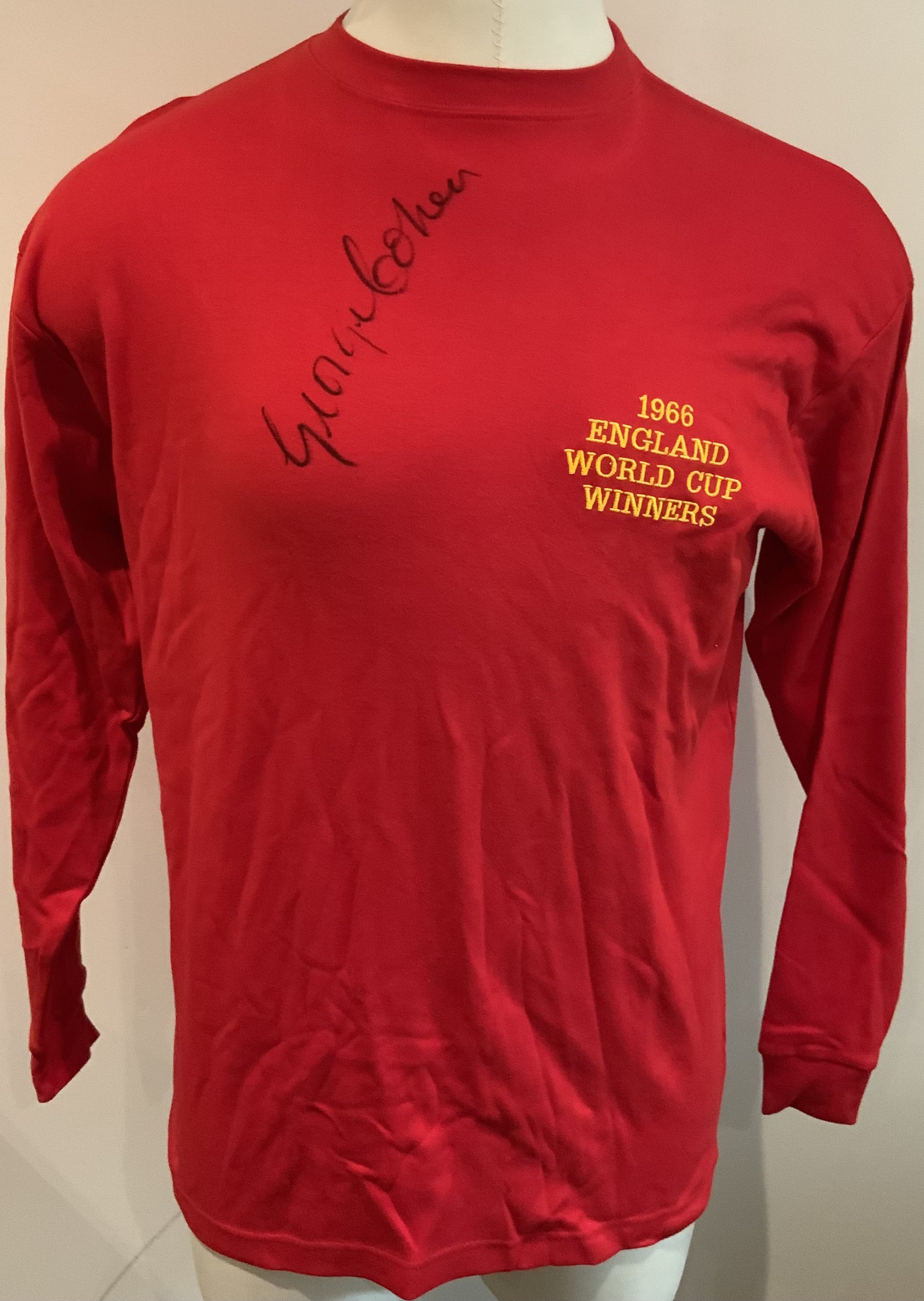 England 1966 World Cup Winners Signed Football Shirts: Red long sleeve large red shirts with the words 1966 World Cup Winners embroidered to breast. Each of the 9 shirts is hand signed without dedication and comes with a COA from a reputable source. Players include Cohen Ball Hurst Peters Stiles Wilson Hunt J Charlton and a yellow shirted Banks. Mint condition. (9)