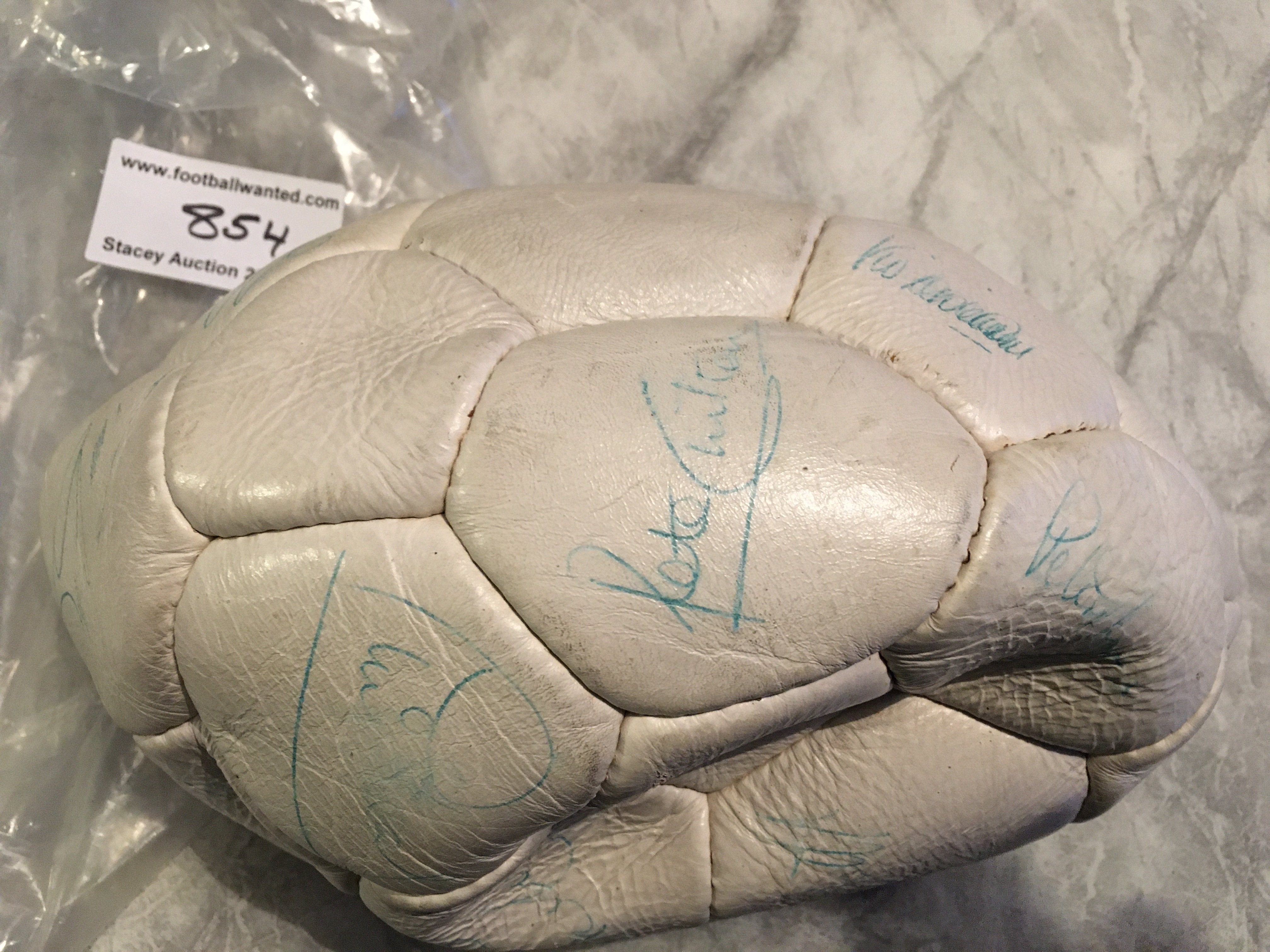 1978 England Signed Football: White deflated panelled ball with around 18 autographs in green biro. Includes Shilton Latchford Brooking Corrigan Coppell Keegan Neal Kennedy and many more. A few are beginning to fade but all legible.