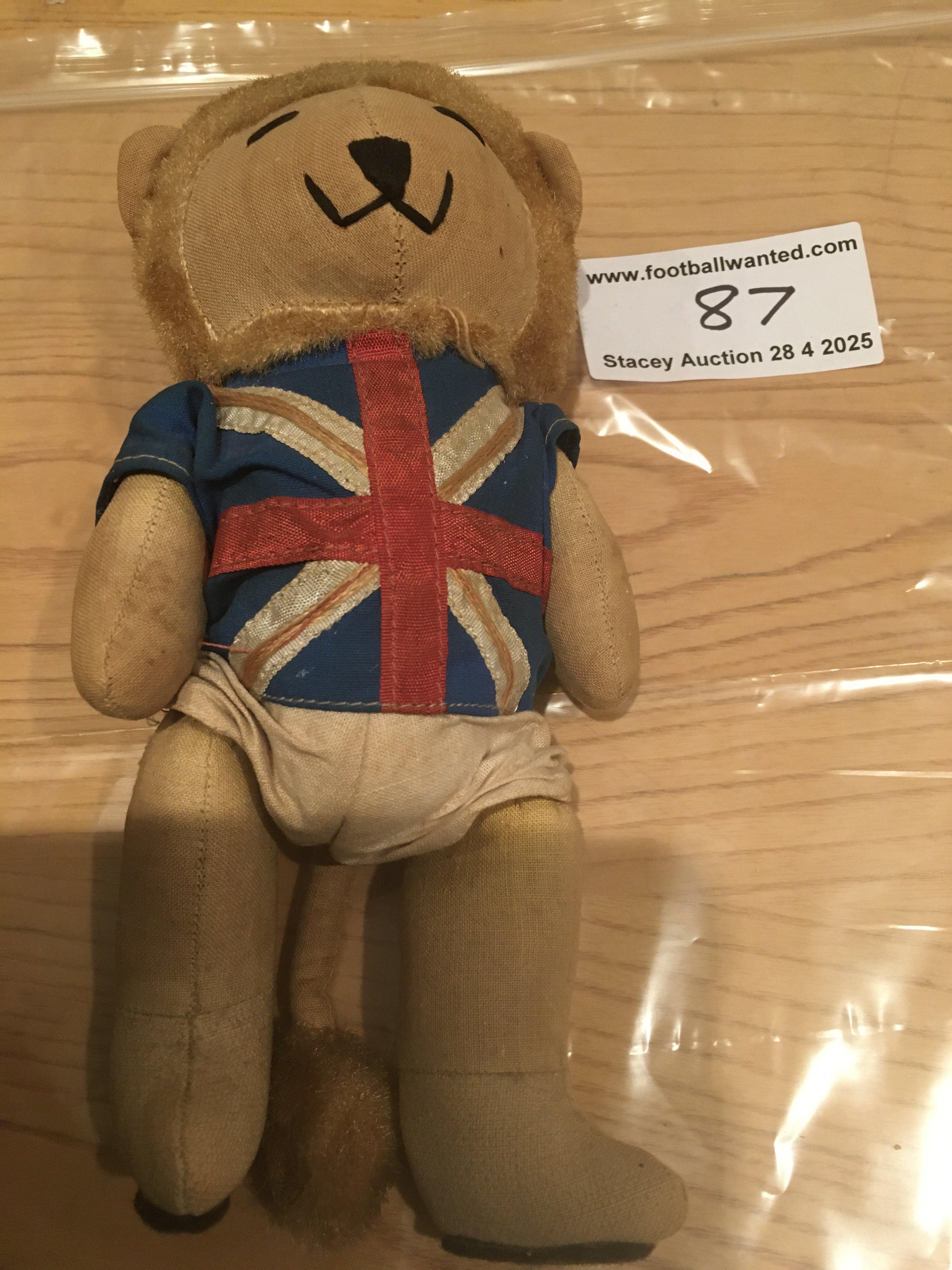 1966 World Cup Willie Lion Mascot Toy: Original 8 inch high WC Willie with tail intact in fair/good condition. Left leg may have been repaired at top.