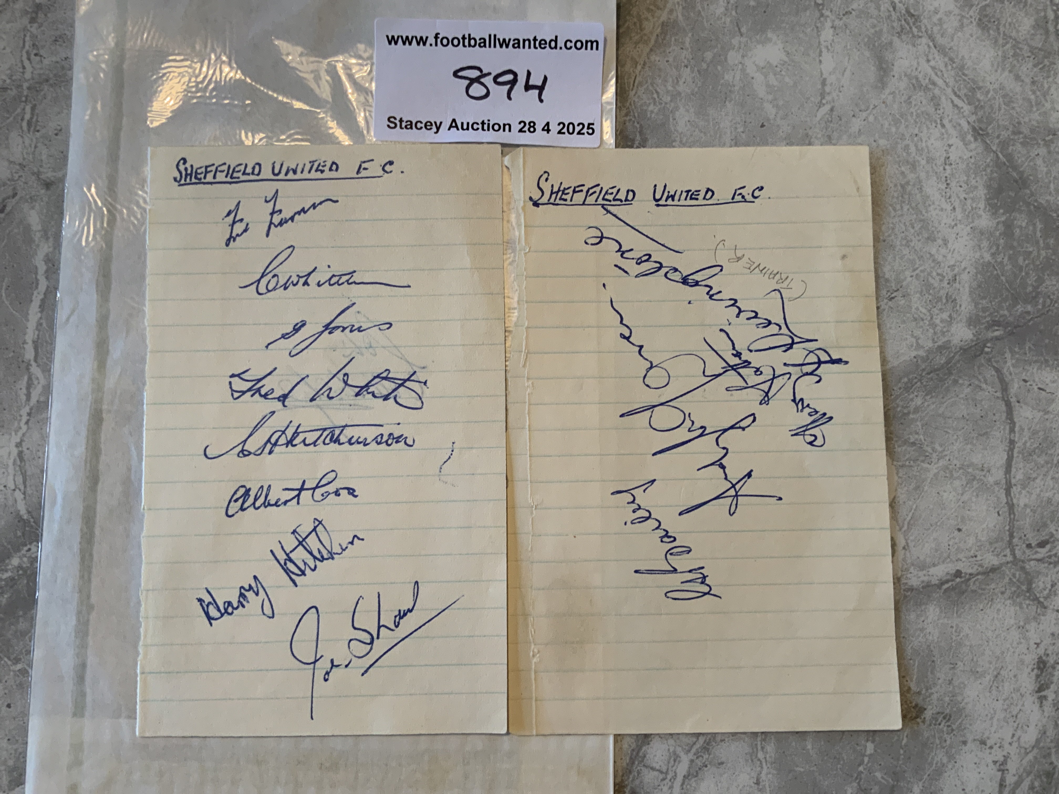 47/48 Sheffield United Football Autographs: Two exercise book pages. Signed by 12 of the squad Including Jones White Shaw Bailey Cox Hutchinson and trainer Livingstone.