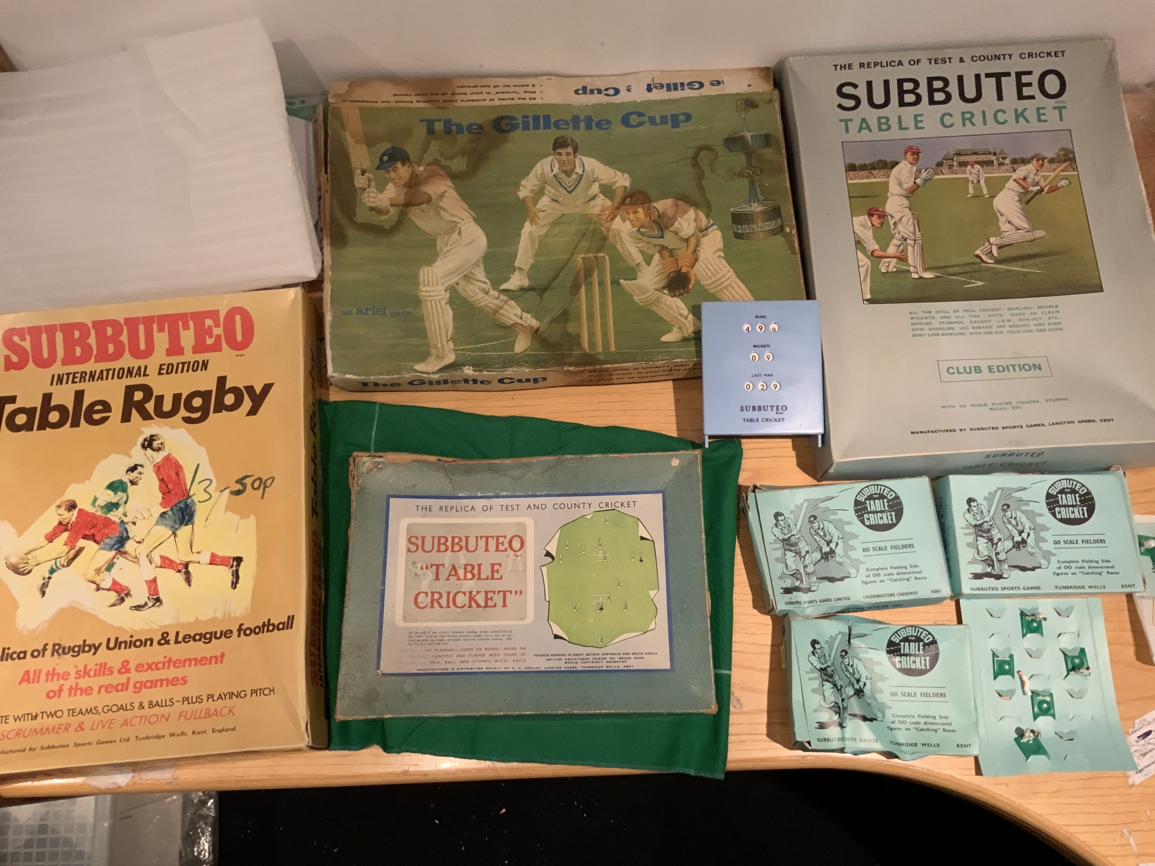Subbuteo Cricket + Rugby Games: Table Rugby could be complete, Table Cricket Club Edition, Table Cricket 1964 plus 3 boxes of fielders. C/W Gilliette Cup Cricket by Ariel. Some boxes damaged and contents not inspected.