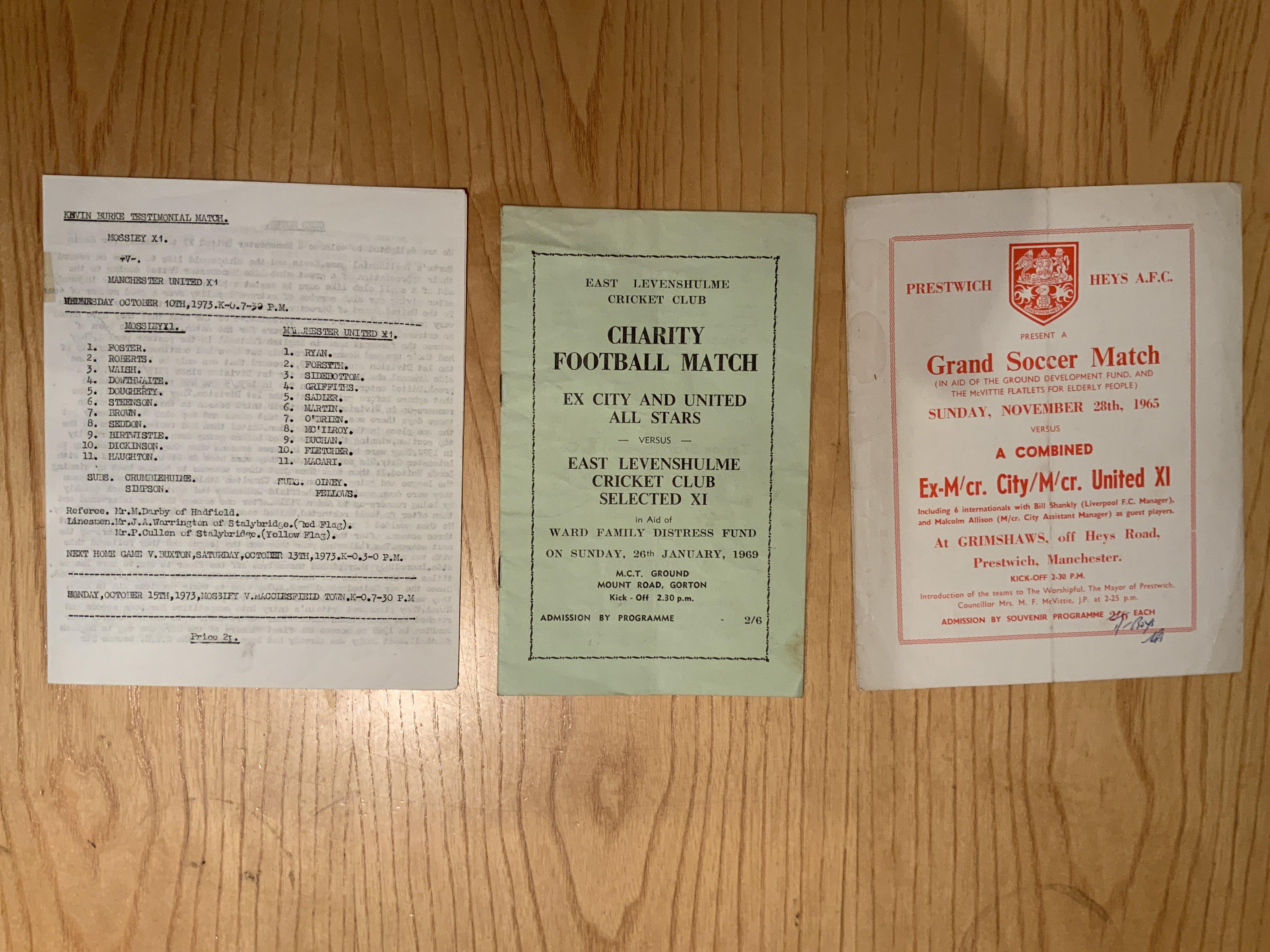 Manchester United Charity Football Programmes: 1969 Ex City + United v East Levenshulme, 1965 Prestwich Heys and 1973 Mossley X1 Burke testimonial. Fair. (3)