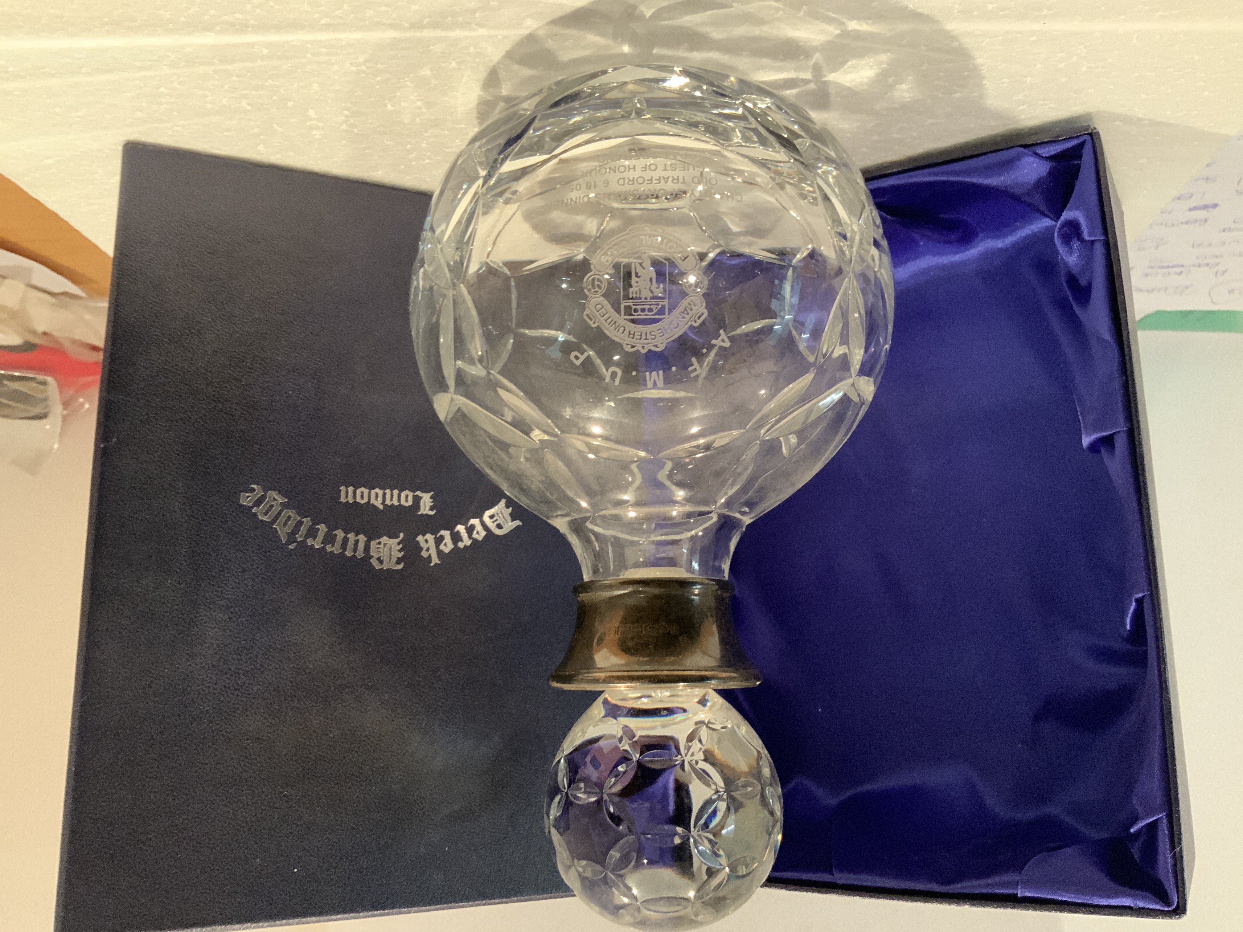 Pat Crerand Manchester United Football Decanter: Presented to Crerand who was guest of honour at a charity dinner at Old Trafford on 6 10 2005. Engraved with the above information from the Association Of Former Manchester United Players. Excellent condition in original box standing 9 inches high.