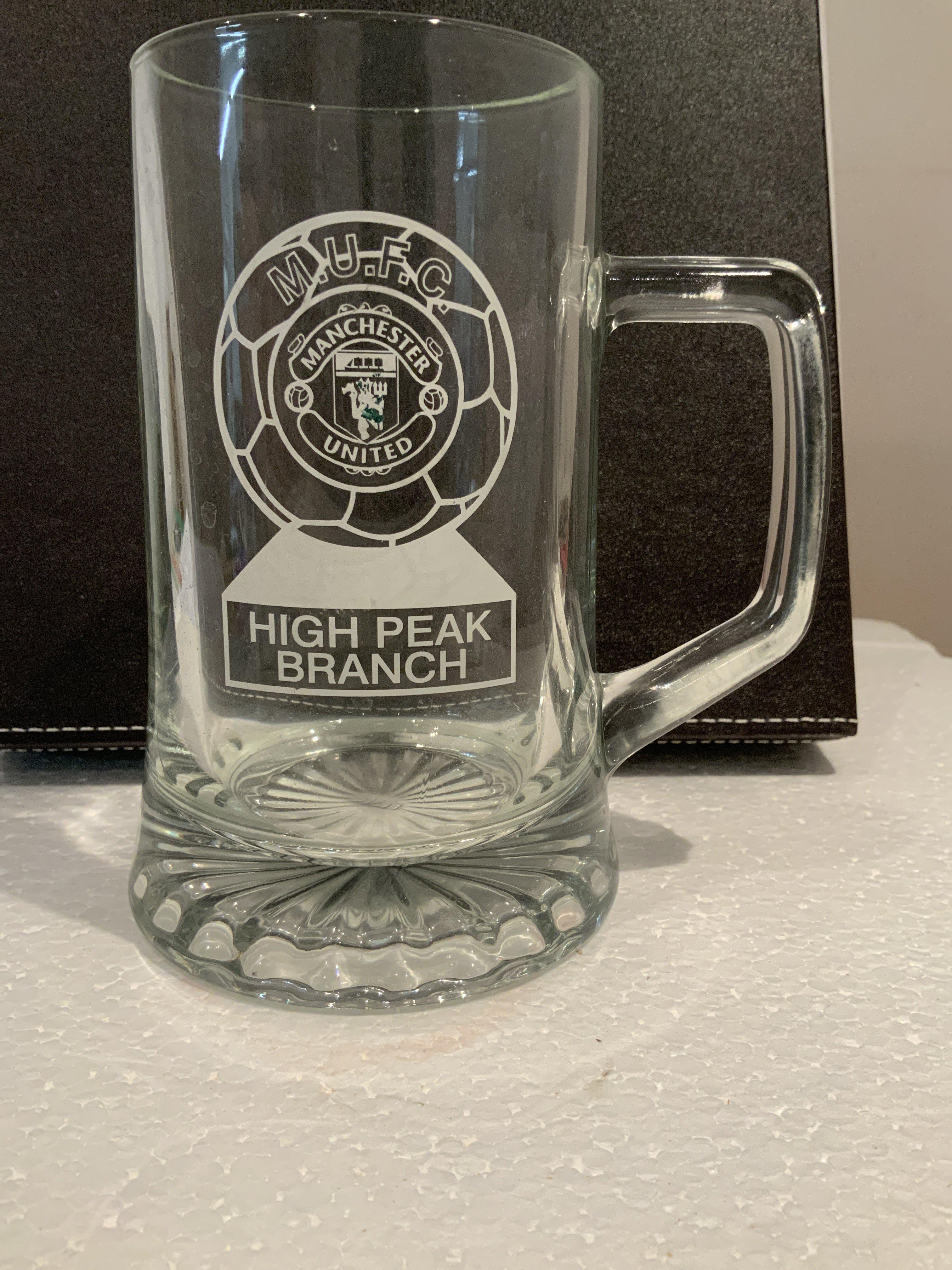 Manchester United High Peak Branch Supporters Club Glass: Sent to Manchester United to give to their player of the year we are informed. High Peak branch was formed in 1999. Heavy glass tankard in good condition.