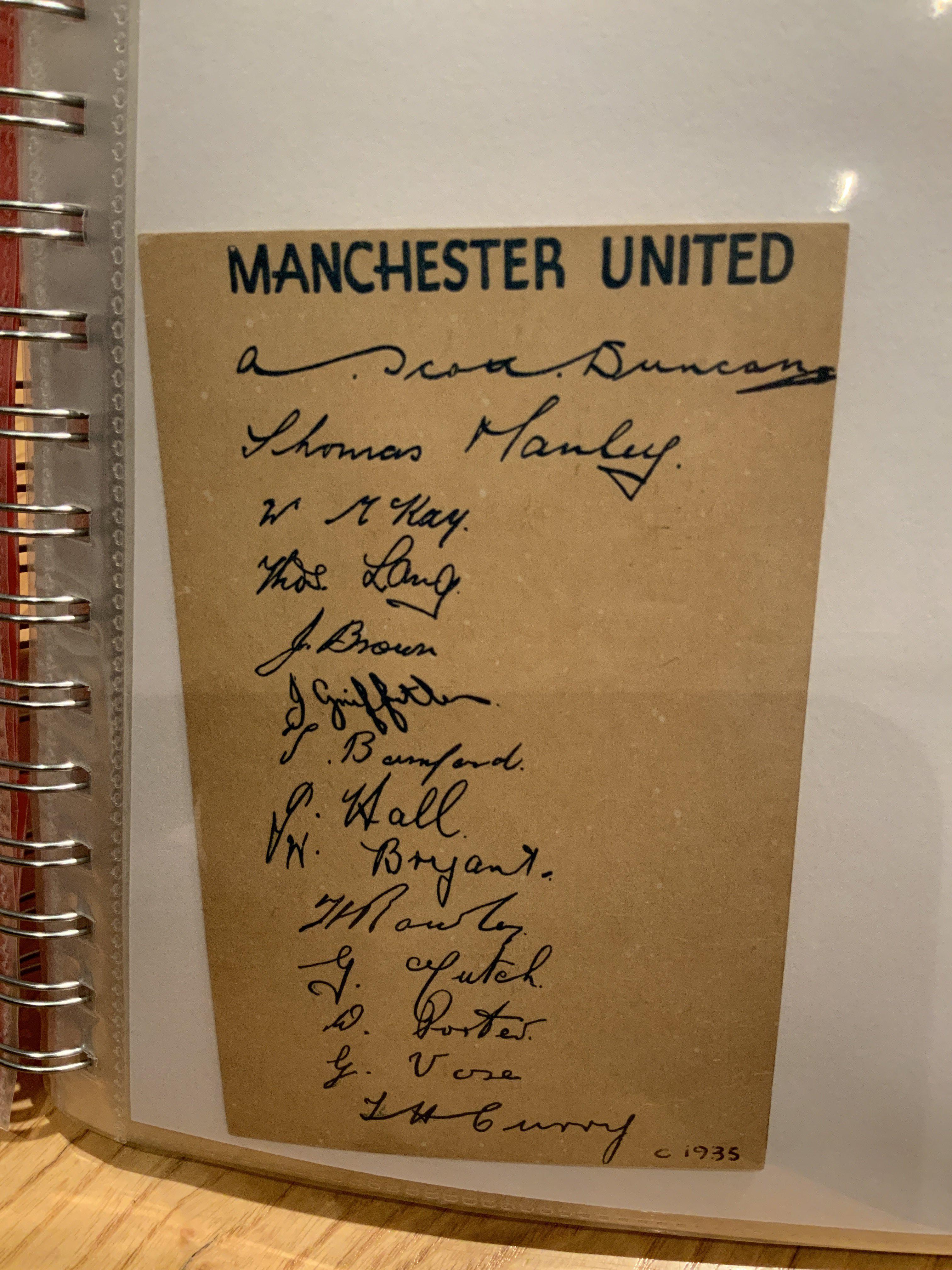 Manchester United Football Memorabilia Folder: Printed autograph sheets to include a 1935 postcard, Order of Service Ray Wilkins, Advert for 67/68 Burnley away, Bobby Charlton stamps, 1908/1909 end of season summary removed from bound volume and more.