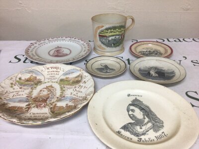 A very early 19th century Sunderland lustre type mug decorated with a view of the iron bridge over the river Wear the reverse with crest of the Mariners Arms  Three small early 19th century dishes depicting children and dogs and three Victorian commemorative plates (7) NO RESERVE.