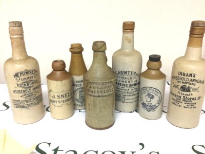 A rare early Victorian stoneware beer bottle I Gunson Wainfleet Three House Hold Ammonia bottles a Victorian wine company Stoneware bottle dated 1865  J Snell Bury st Edmunds and others.