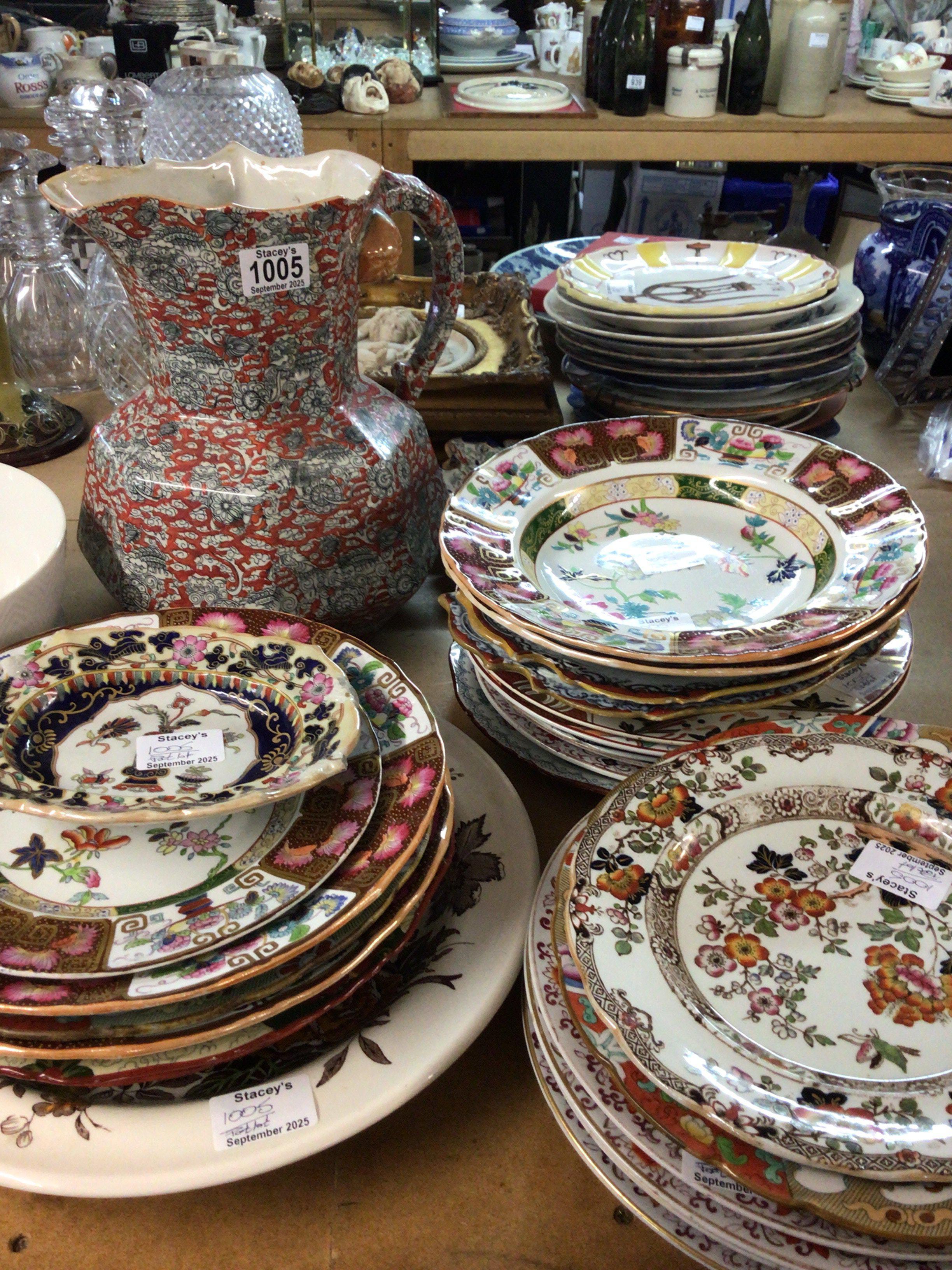 A collection of Victorian and later Ironstone China including Masons a large jug and numerous plates including part sets. No Reserve