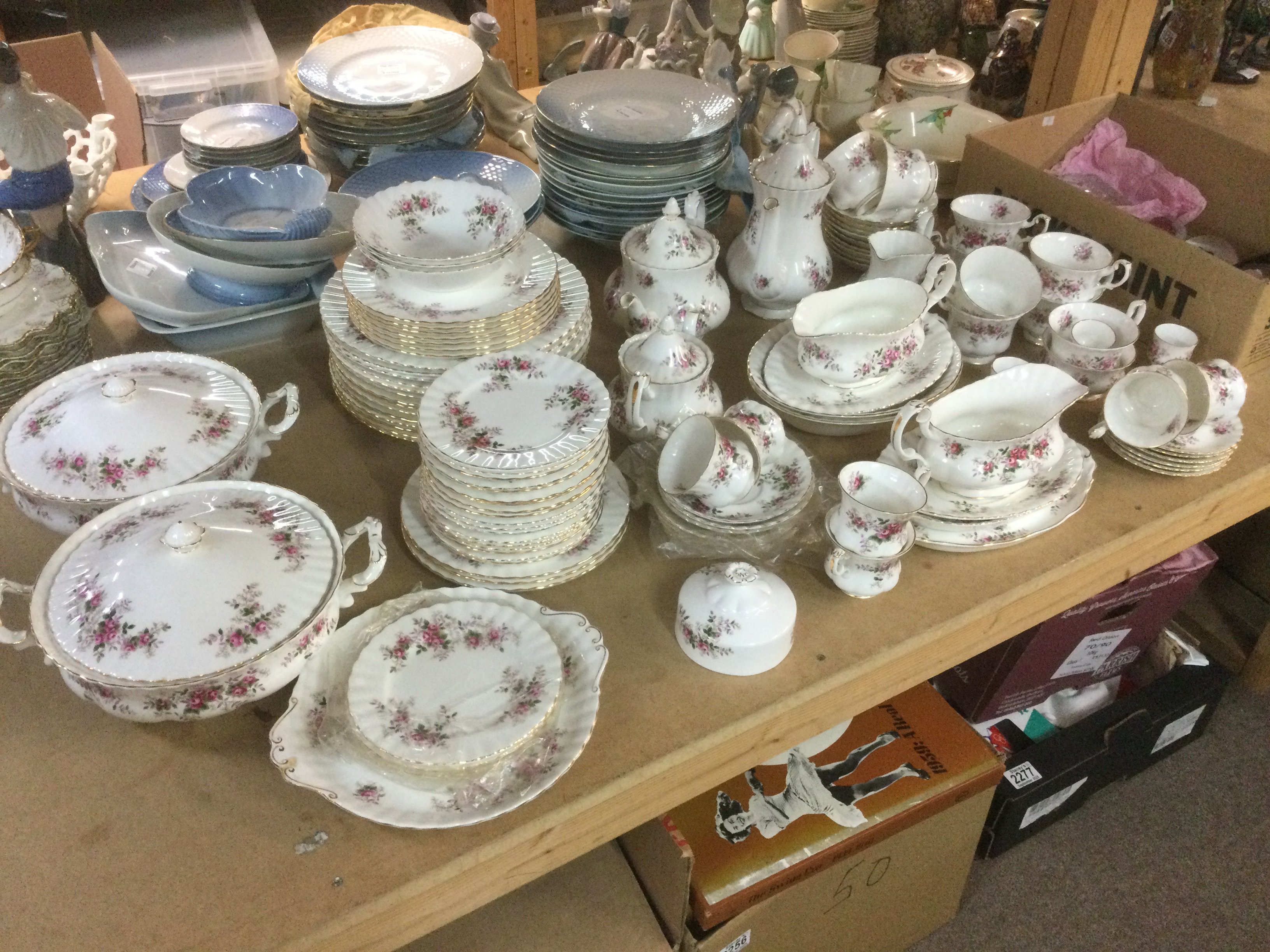 A Royal Albert tea and dinner service in Lavender Rose pattern. Shipping category D.