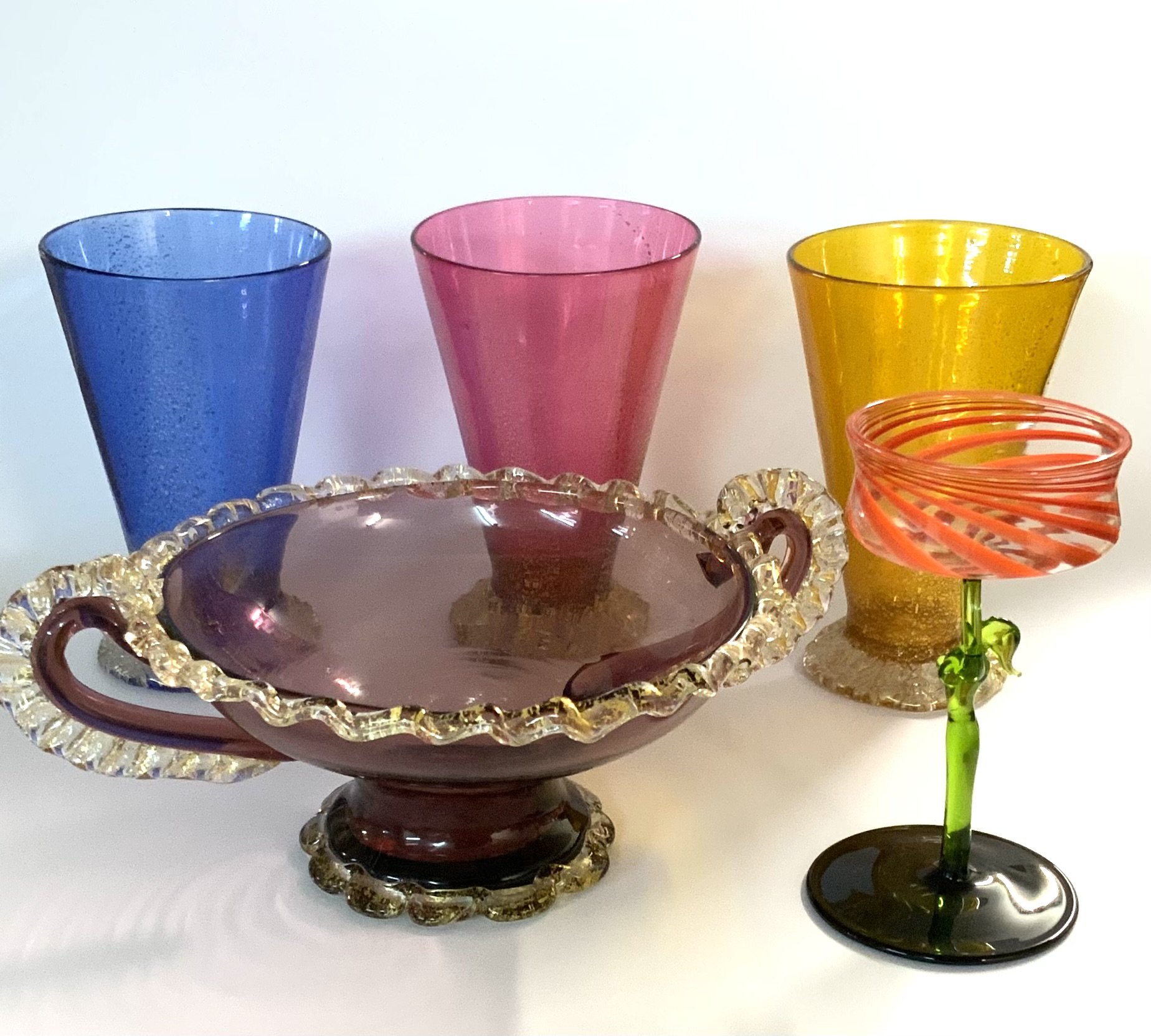 3 Italian Murano glass beakers, a small Italian 2 handled bowl, small Italian liquor glass the stem in the form of a nude woman. (D)