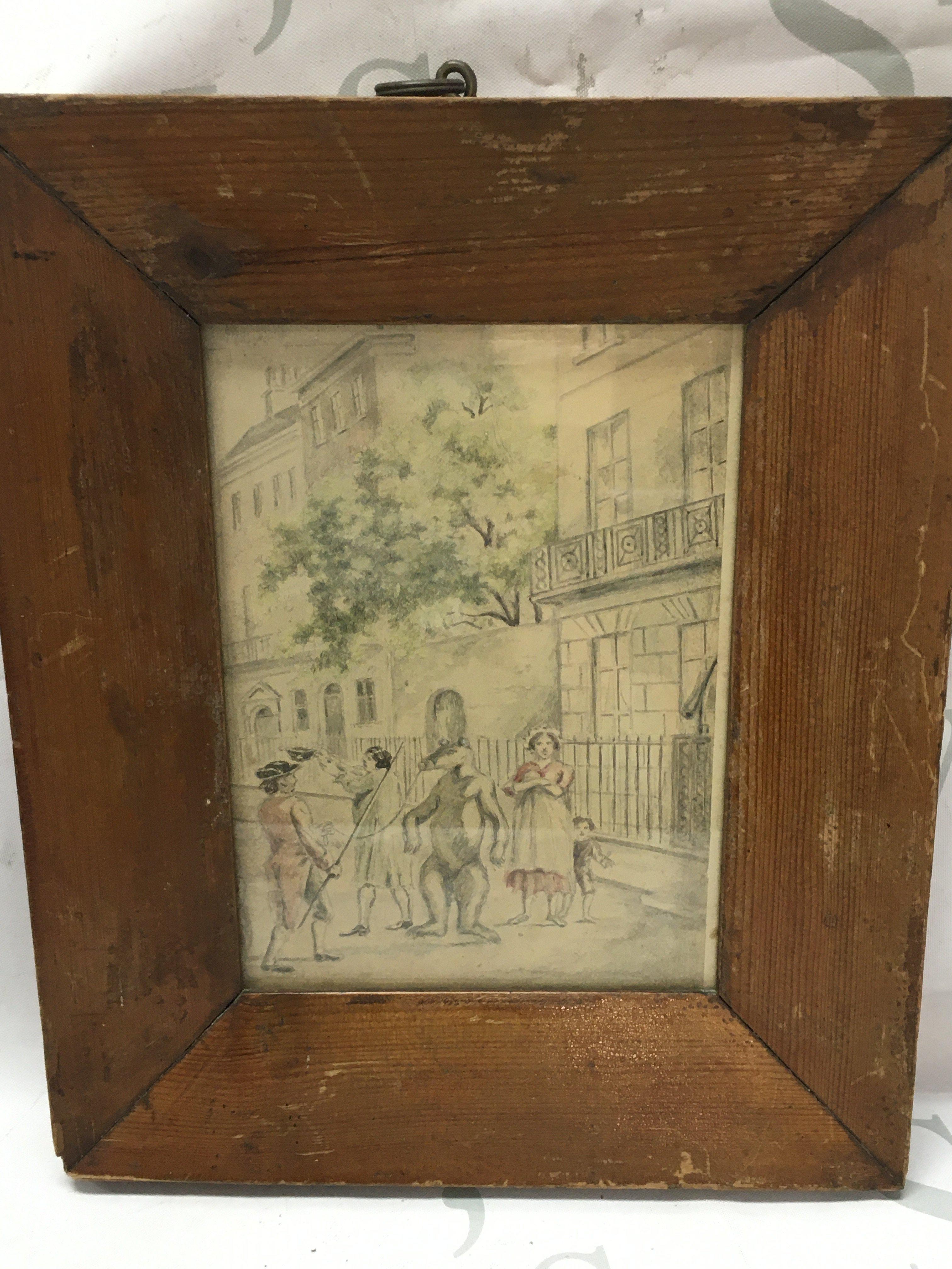 An interesting Georgian framed small watercolour street scene with figure showing tame bear to three figures. Frame dimensions 23x28cm This lot cannot be posted