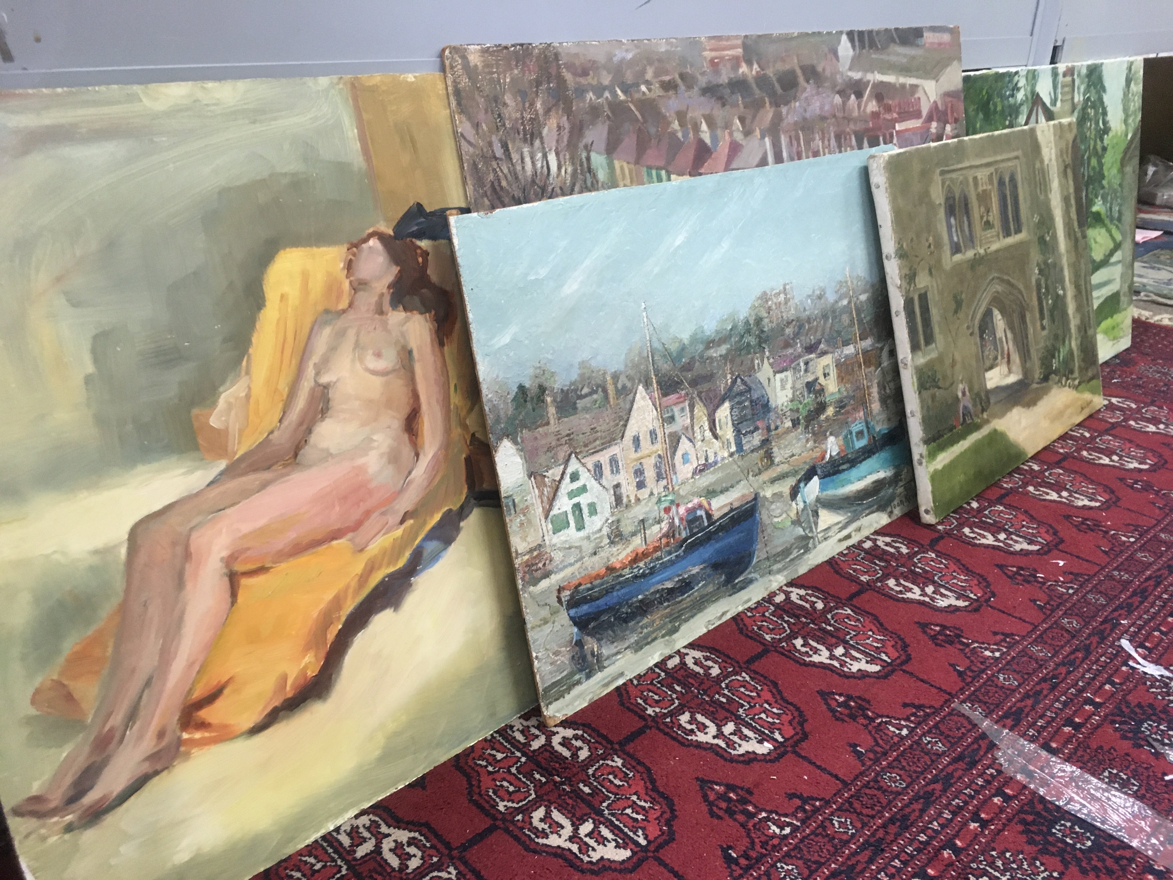 A collection of unframed oil on canvas paintings by Jean Kevan (1916-2006). Back Gardens in Southend, Country lane, nude etc.