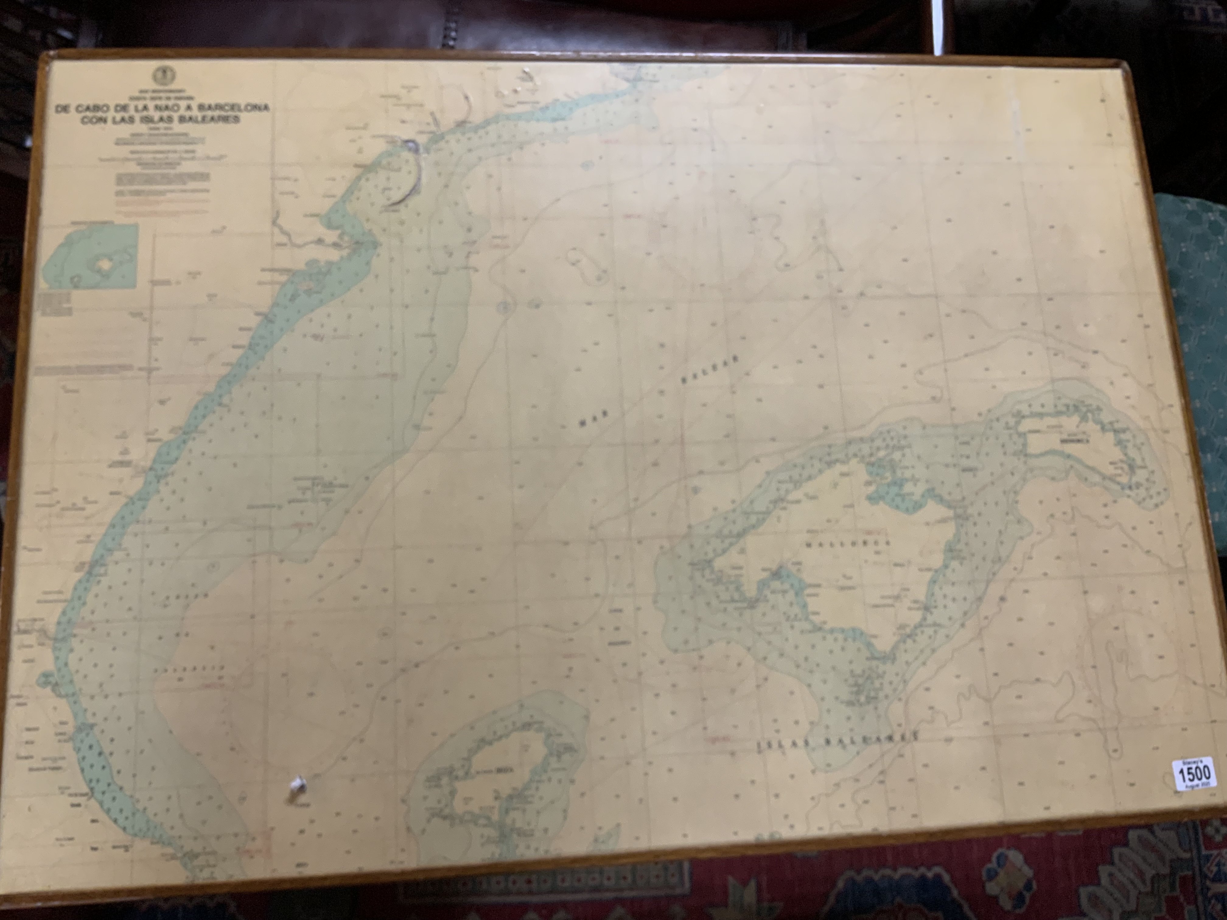 A Folding ships table inset with a map of the Balearic Islands, 105cm x 73cm adjustable height.- NO RESERVE