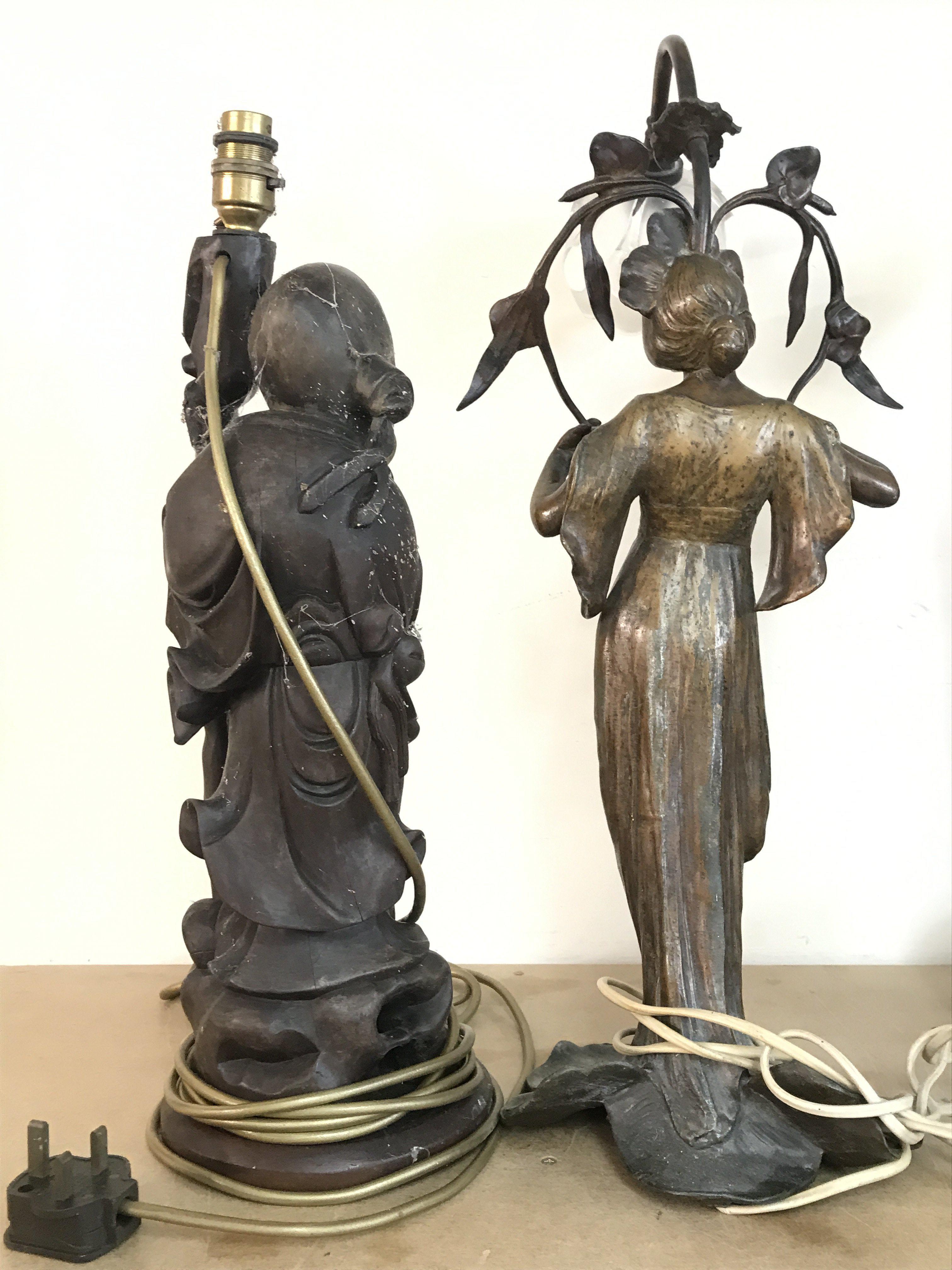 An Art Nouveau style simulated bronze lady figure lamp and a Chinese wooden carved figure lamp. This lot cannot be posted- NO RESERVE