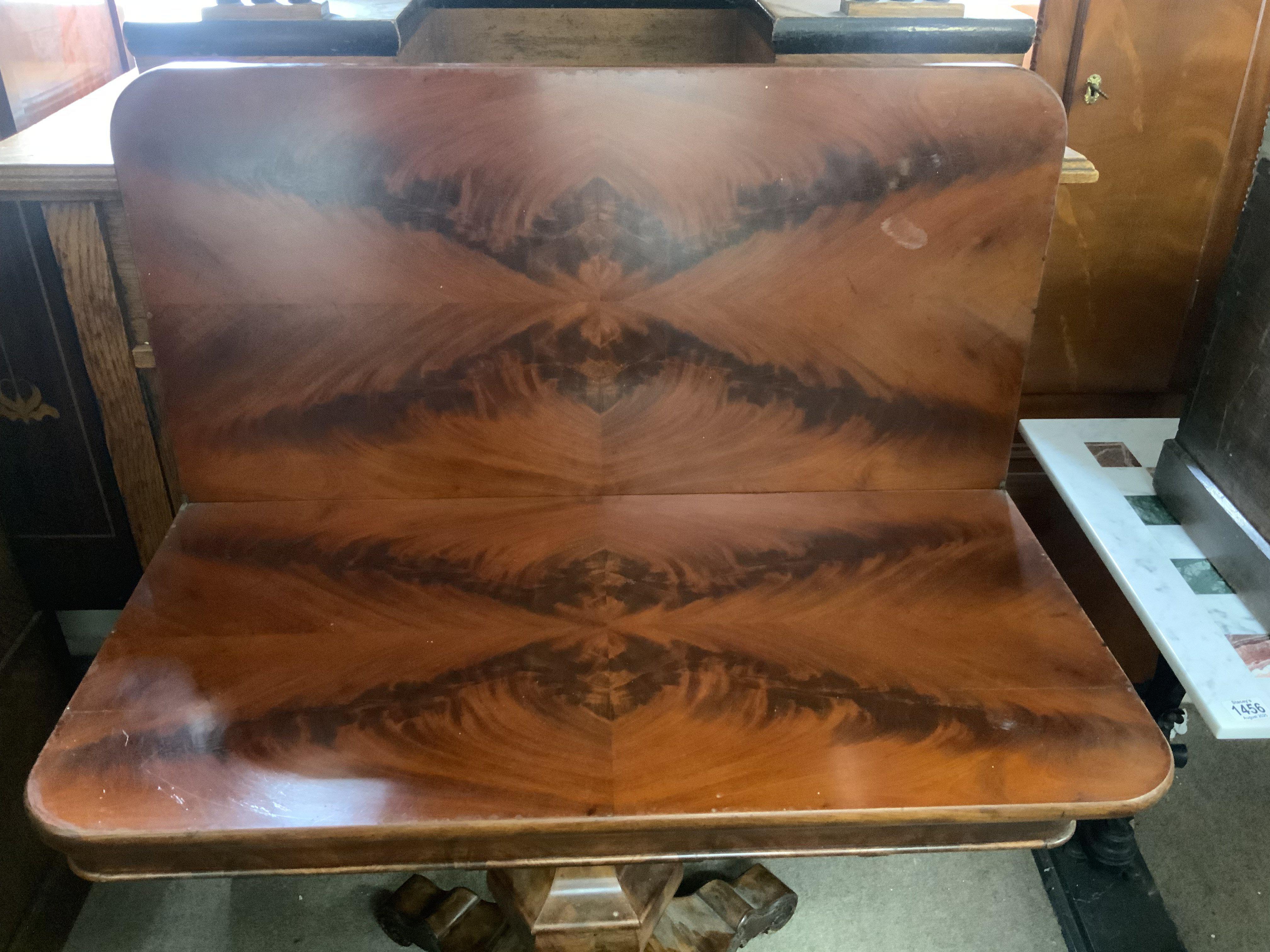 A quarter veneered mahogany folding breakfast table. (Bolt missing)- NO RESERVE
