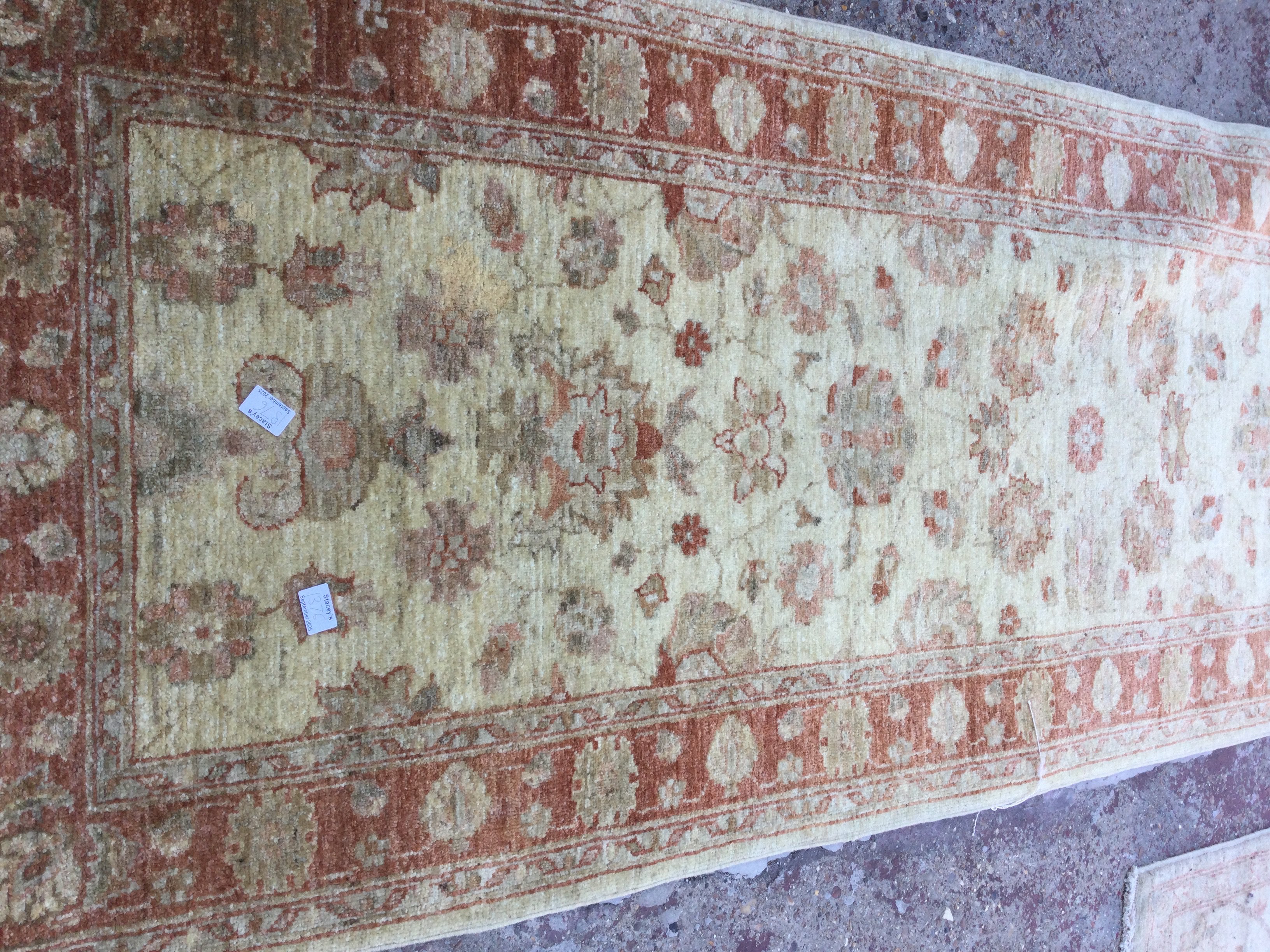 A Afghan floral ivory ground runner 280 cm x90 cm