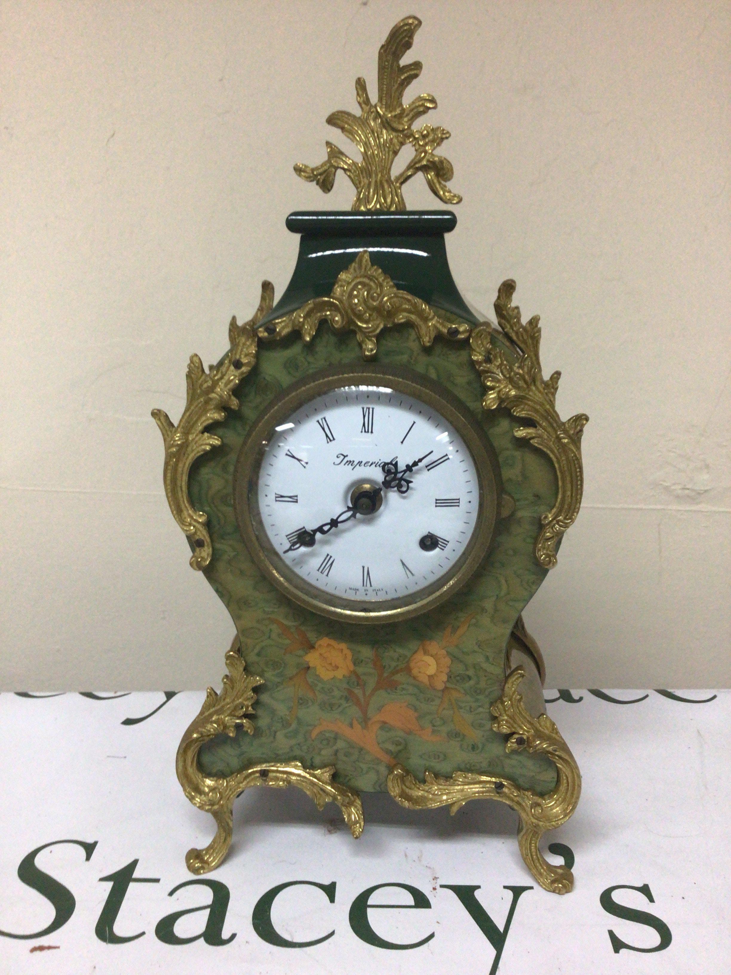 An Italian Imperial mantel clock with marquetry decoration on a green ground with applied gilt metal mounts with Key Height 38cm