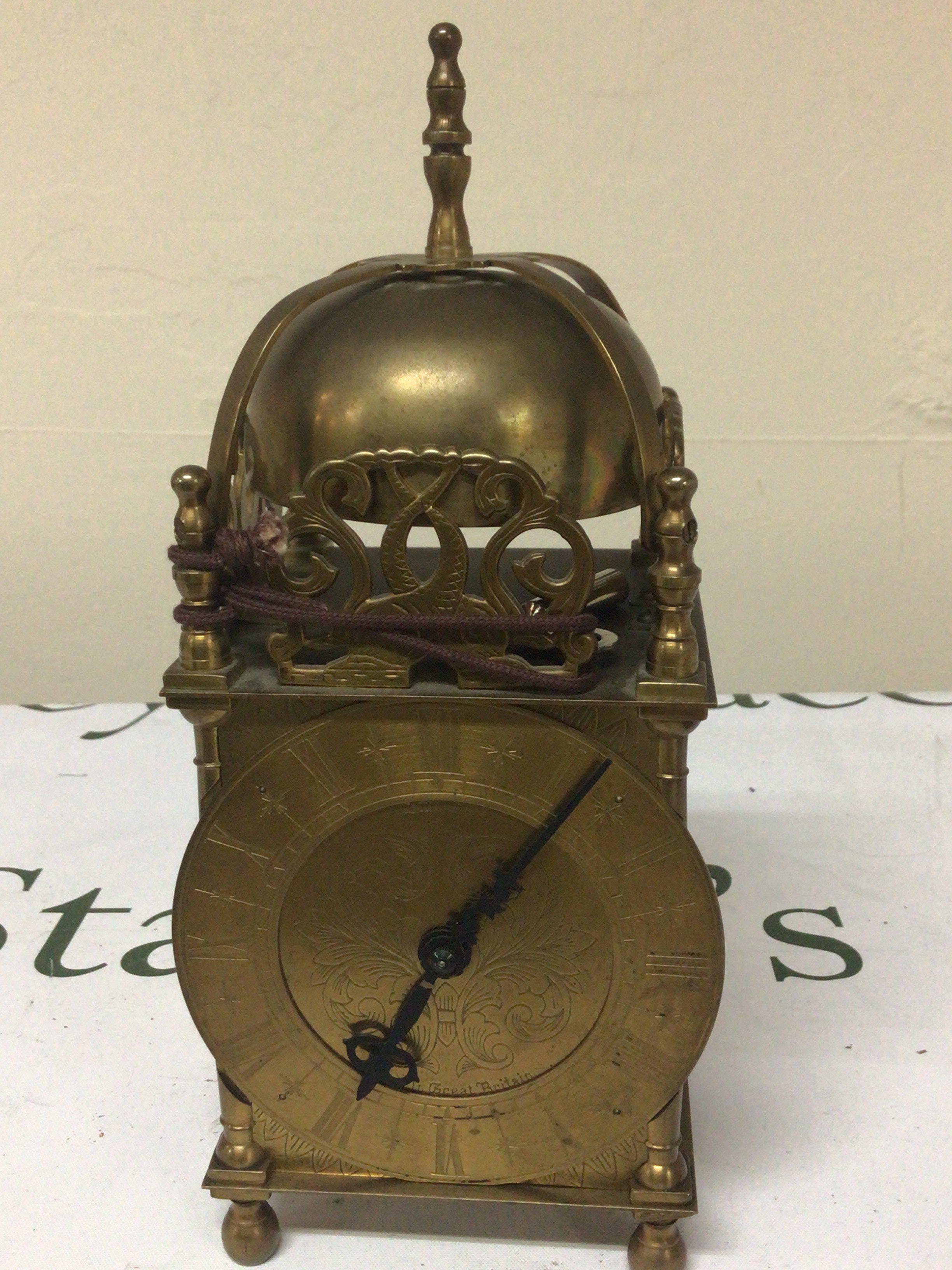 A Brass cased Lantern type British made with key height 26cm