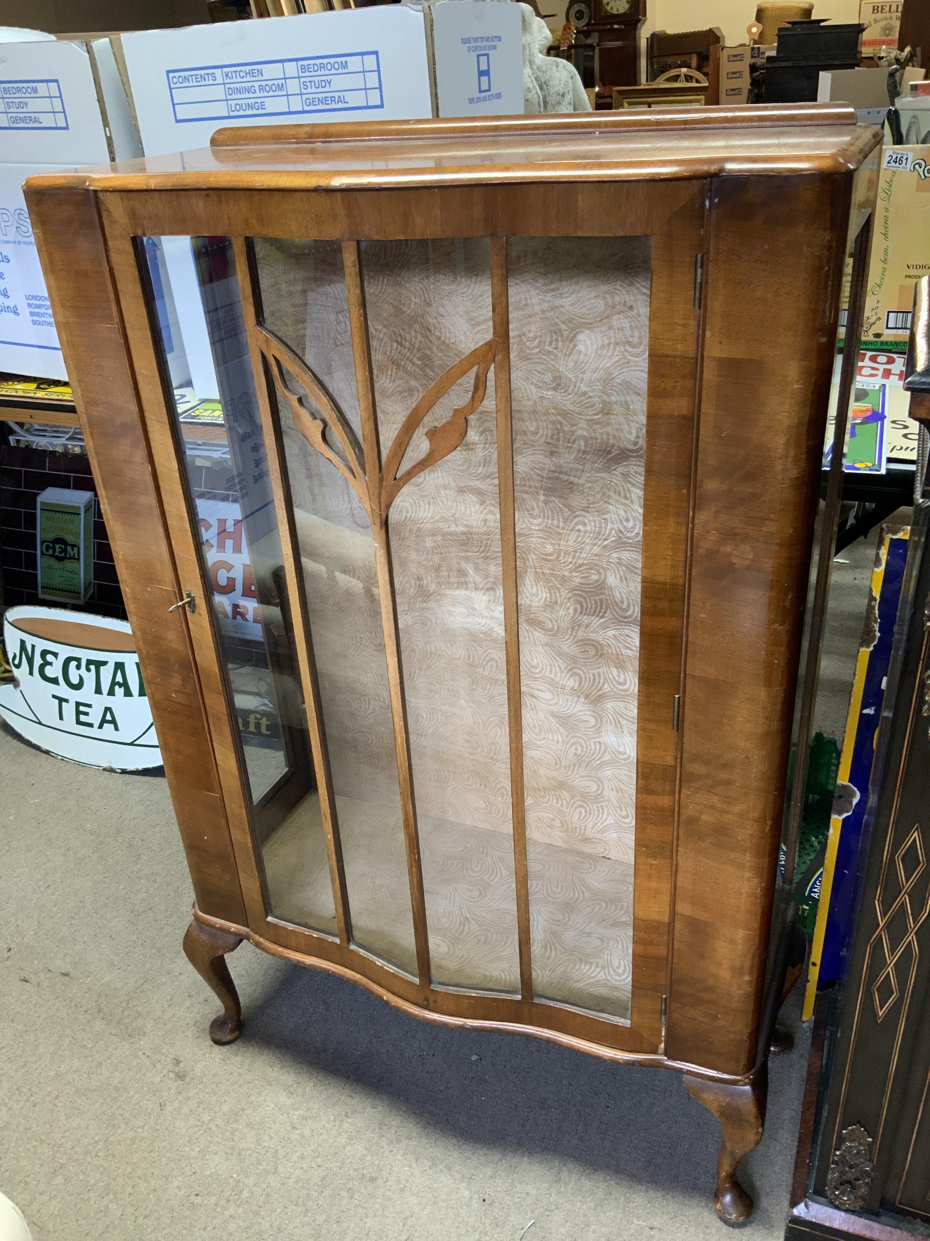 A 1950s veneered display cabinet. 107cm x 74cm