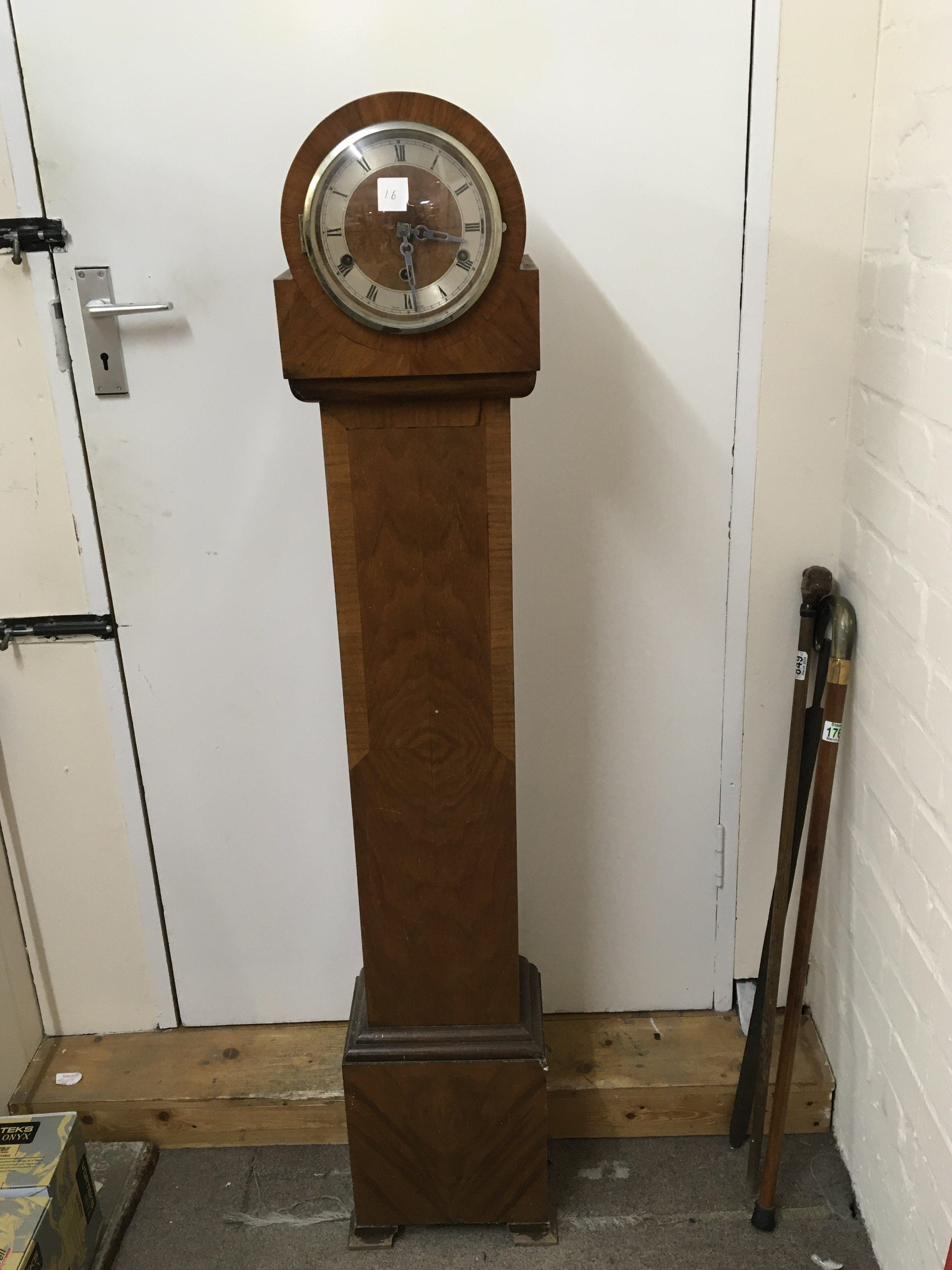 An Art Deco walnut Grandmother clock. Hight 141cm