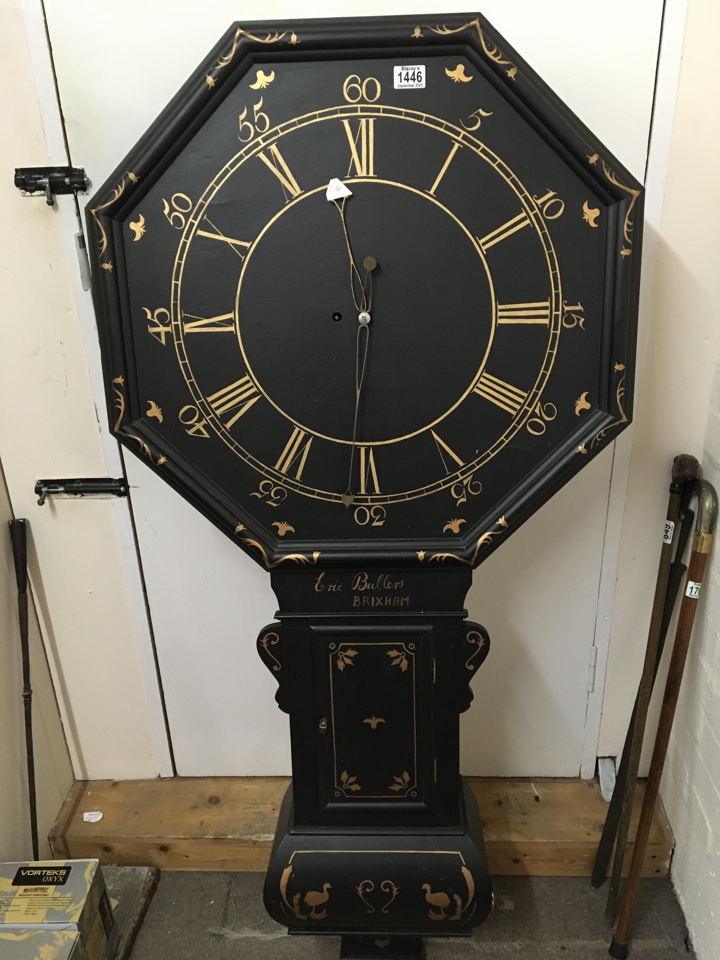 A large Taven clock with painted case and octagonal dial with the inscription Eric Bullers Brixham fitted with a brass fusee movement with pendulum. The movement is an original the case later made copying the original case.