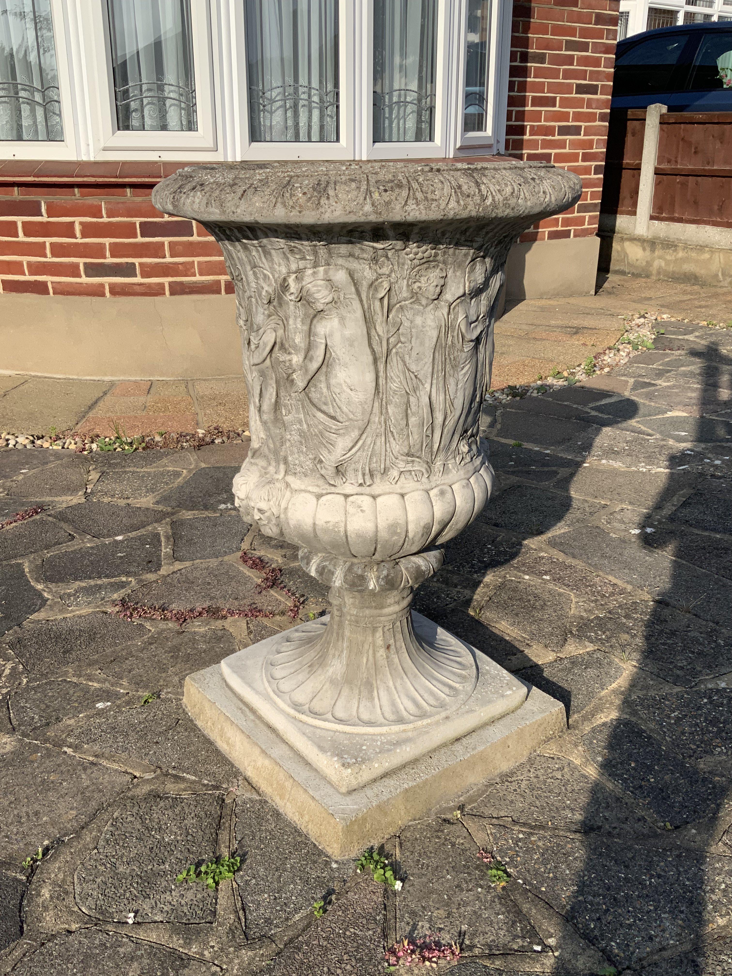 A large cast concrete planter of a classical design with pedastal base. (Sold in situ) Diameter 90cm x Height 163cm.