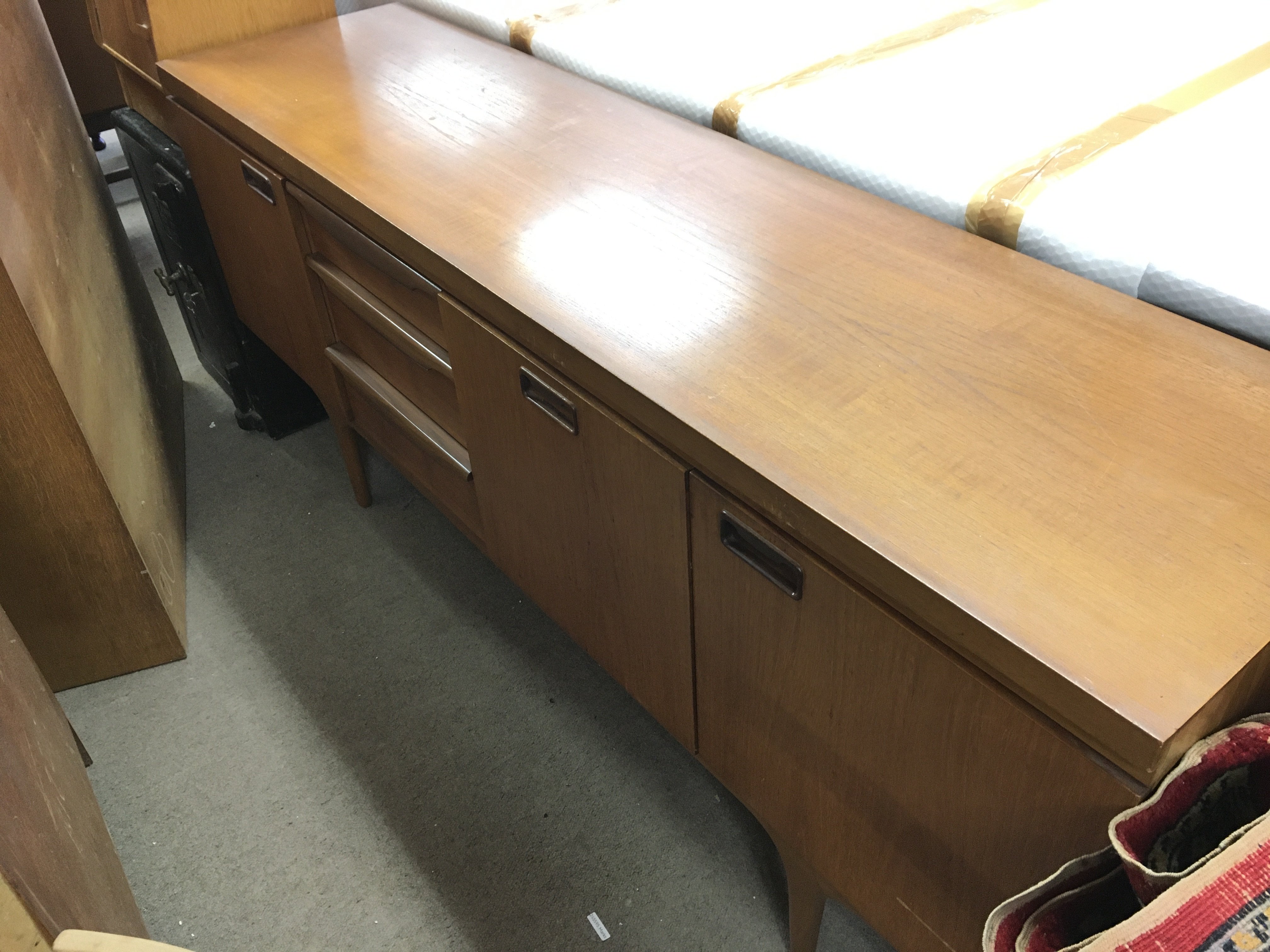 a mid 20th century teak sideboard 177 wide x45 long x78cm tall approximately